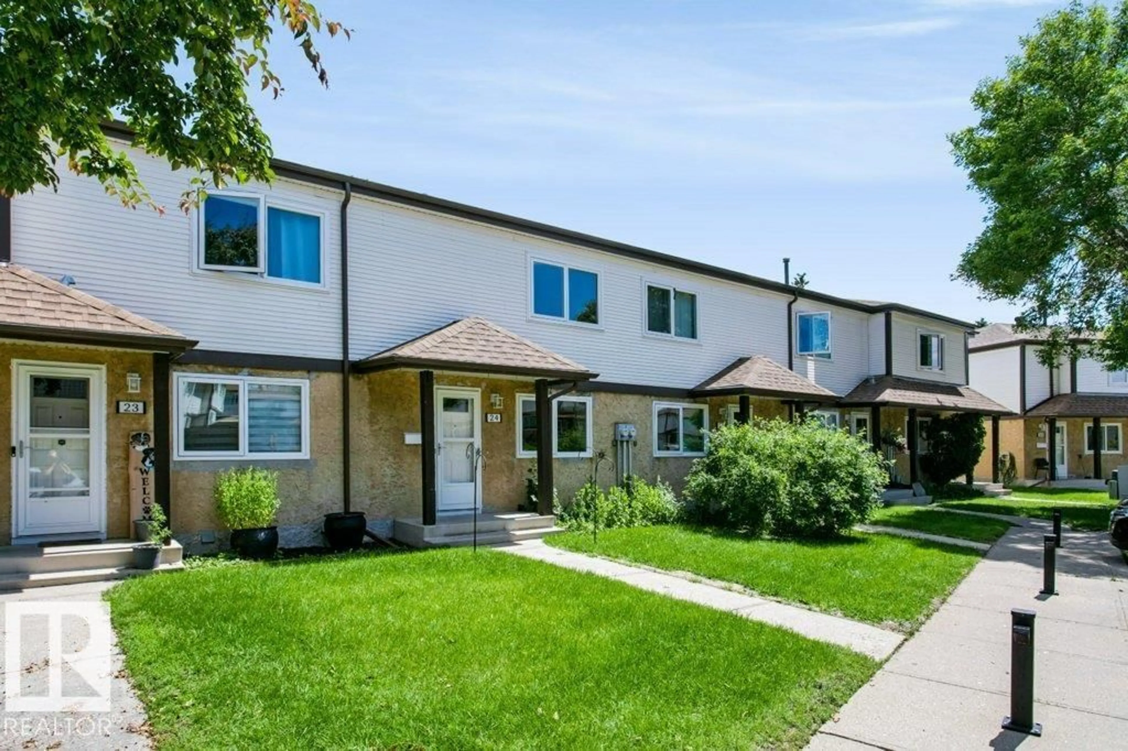 Home with vinyl exterior material, street for #24 - 14511 52 ST, Edmonton Alberta T5A4M6