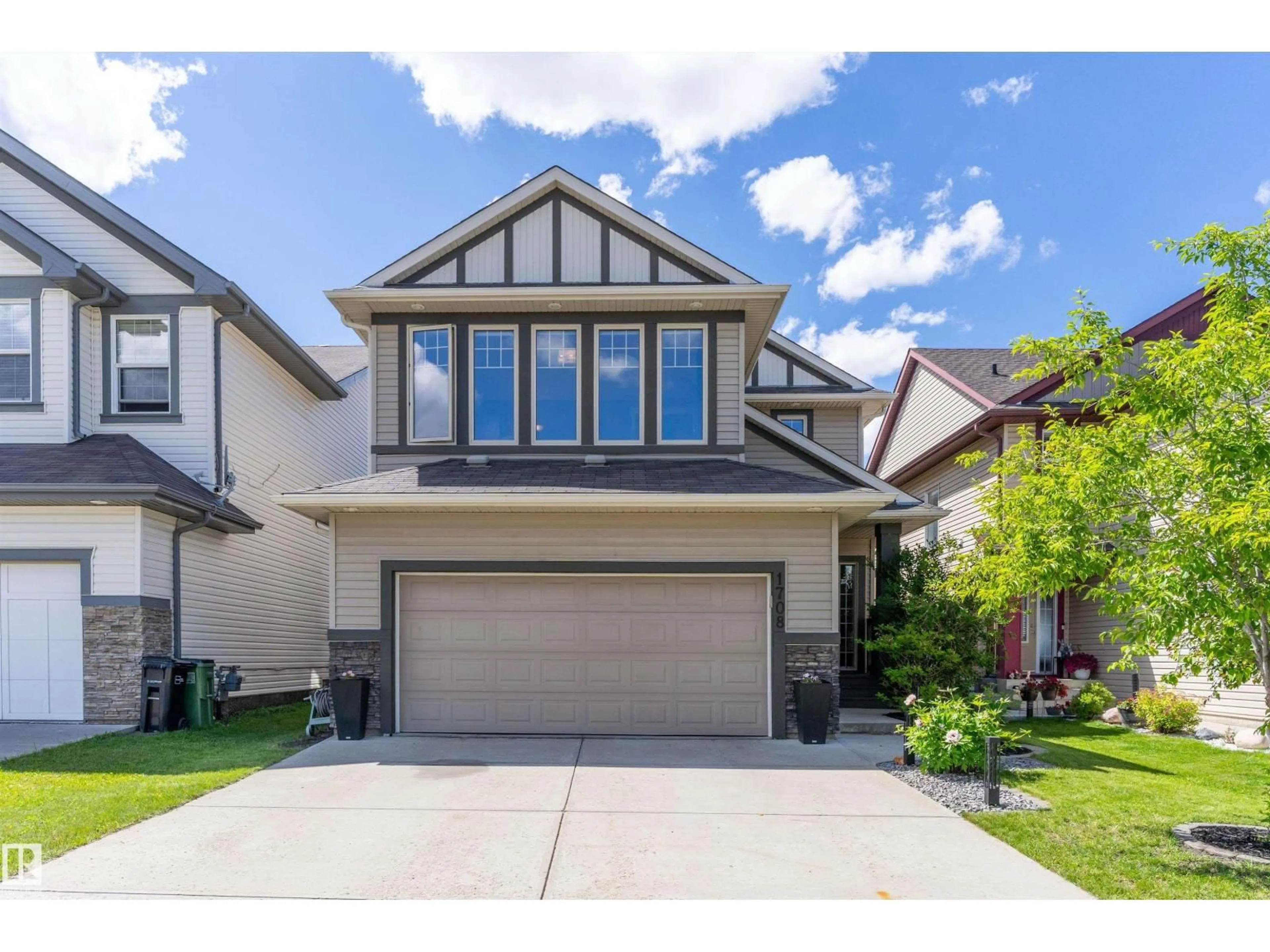 Home with vinyl exterior material, street for 1708 32 ST, Edmonton Alberta T6T0P5
