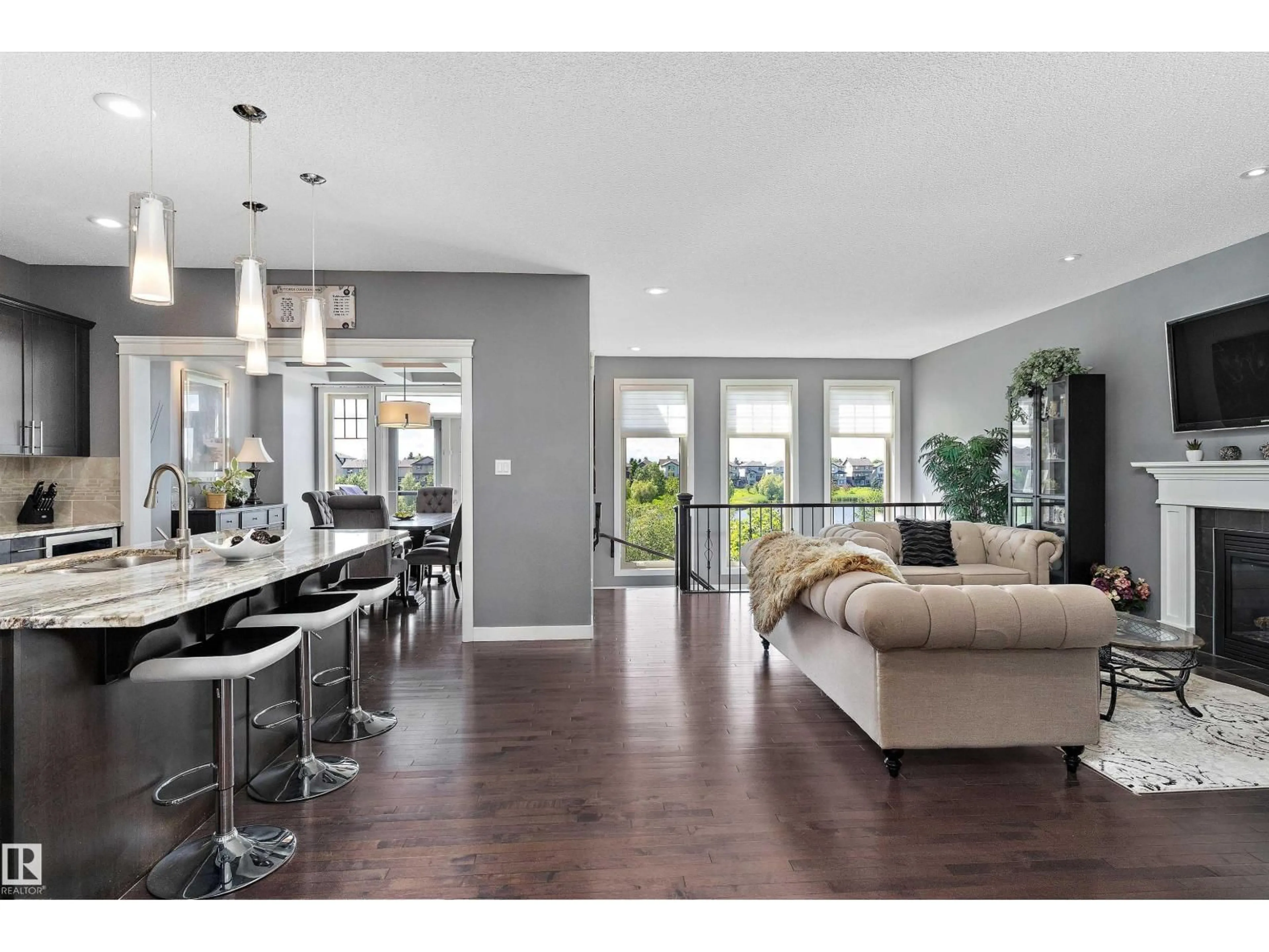 Open concept kitchen, wood/laminate floor for 1708 32 ST, Edmonton Alberta T6T0P5