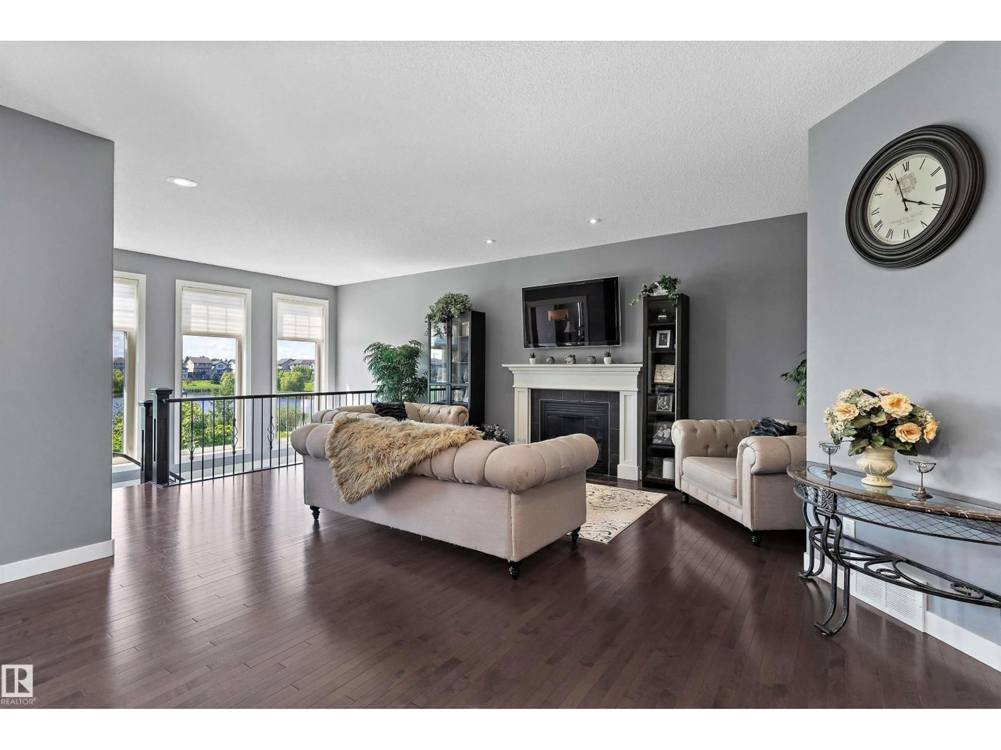 Living room with furniture, wood/laminate floor for 1708 32 ST, Edmonton Alberta T6T0P5