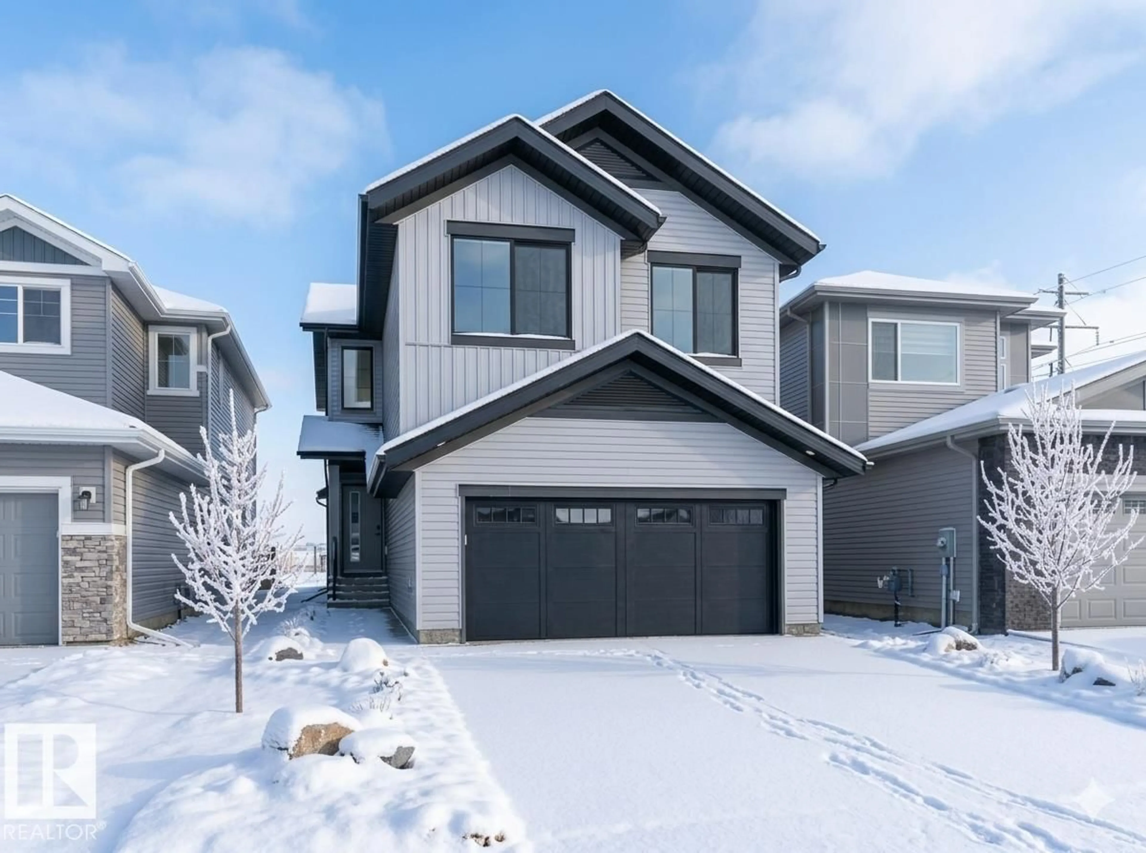 Home with vinyl exterior material, street for 911 18 AV, Edmonton Alberta T6T2X3