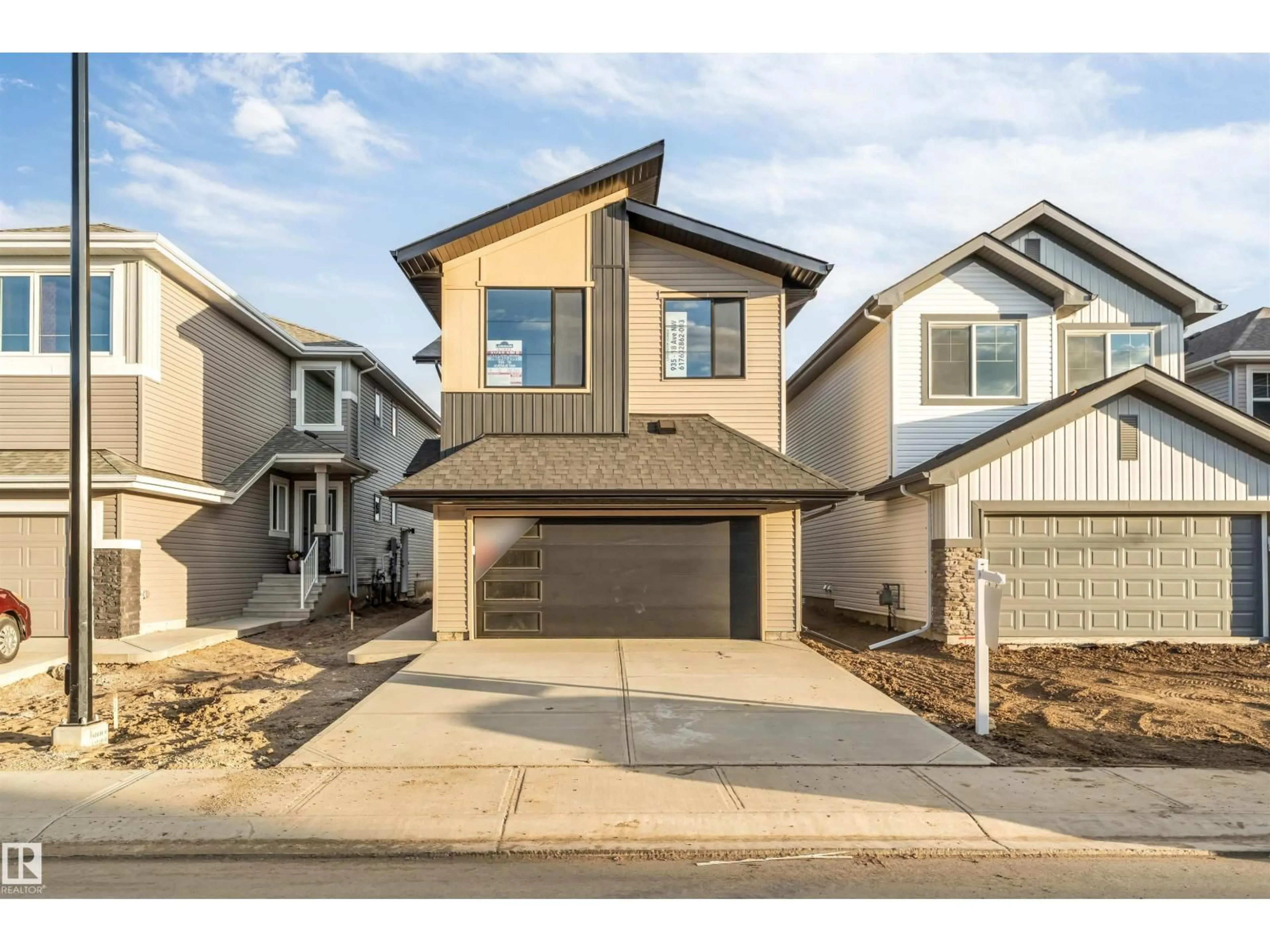 Home with brick exterior material, street for 935 18 AV, Edmonton Alberta T6T2X3