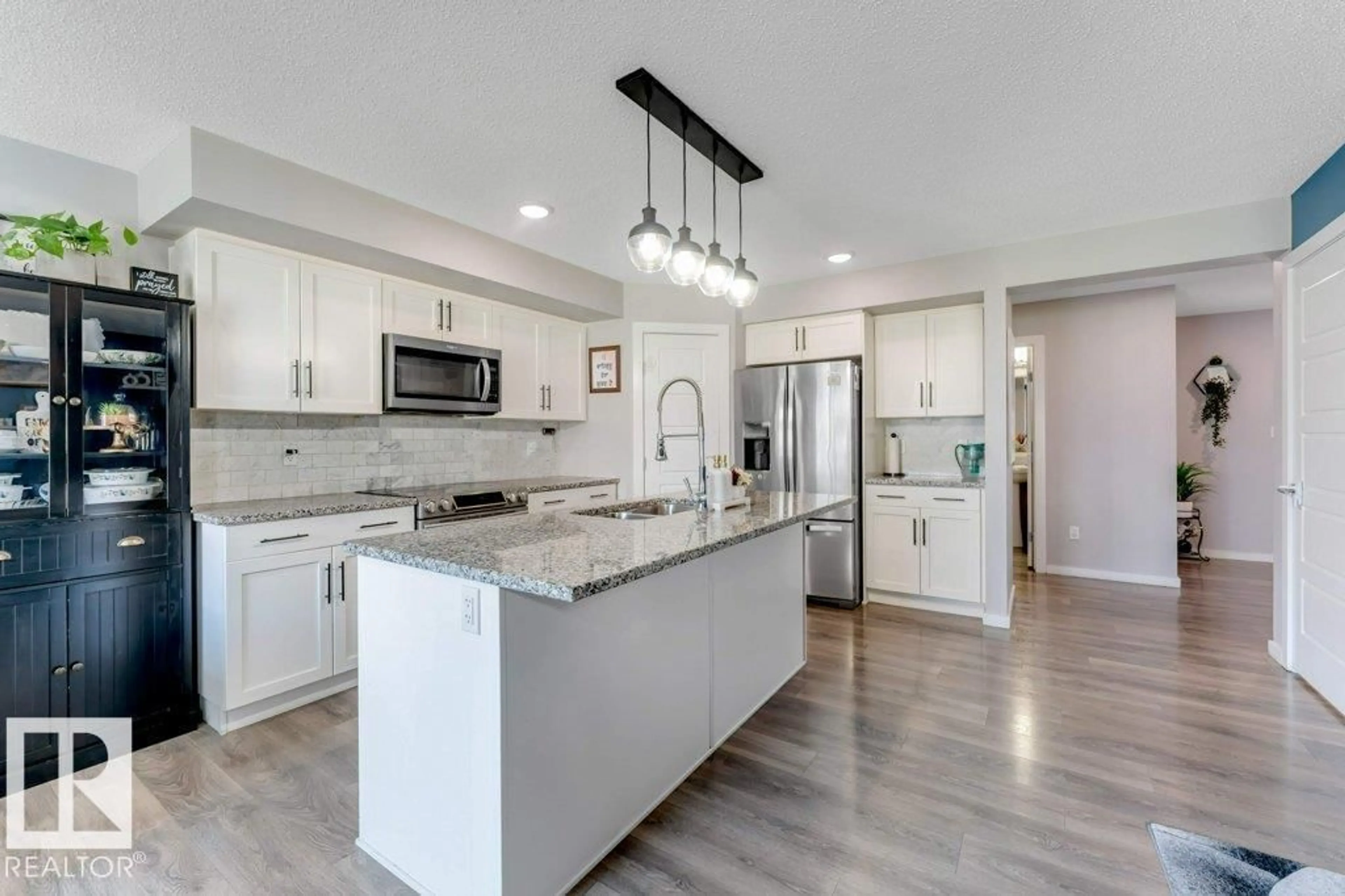Open concept kitchen, ceramic/tile floor for 4441 6A ST, Edmonton Alberta T6T0Z7