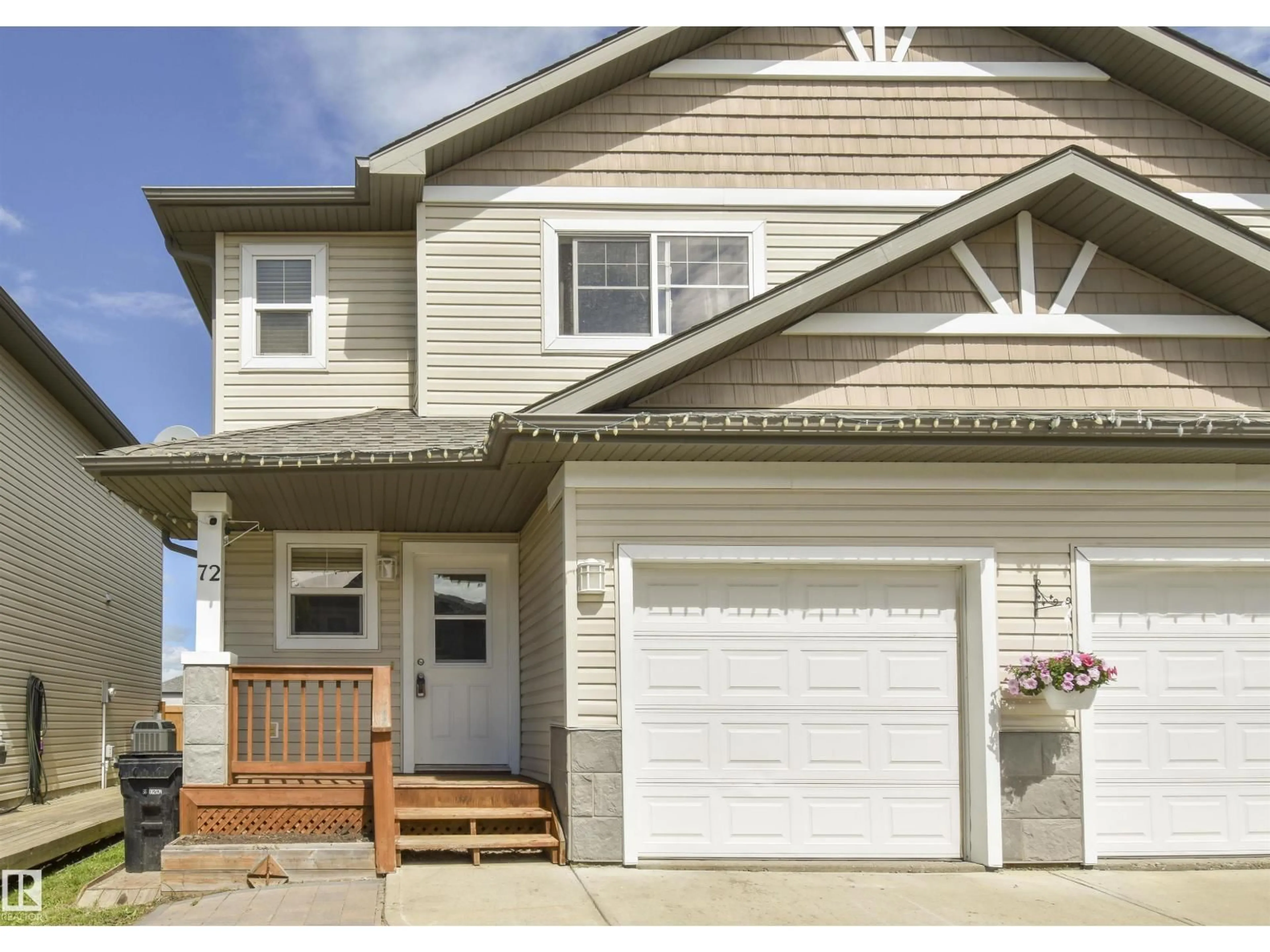 Home with vinyl exterior material, street for 72 HARTWICK LD, Spruce Grove Alberta T7X0A5