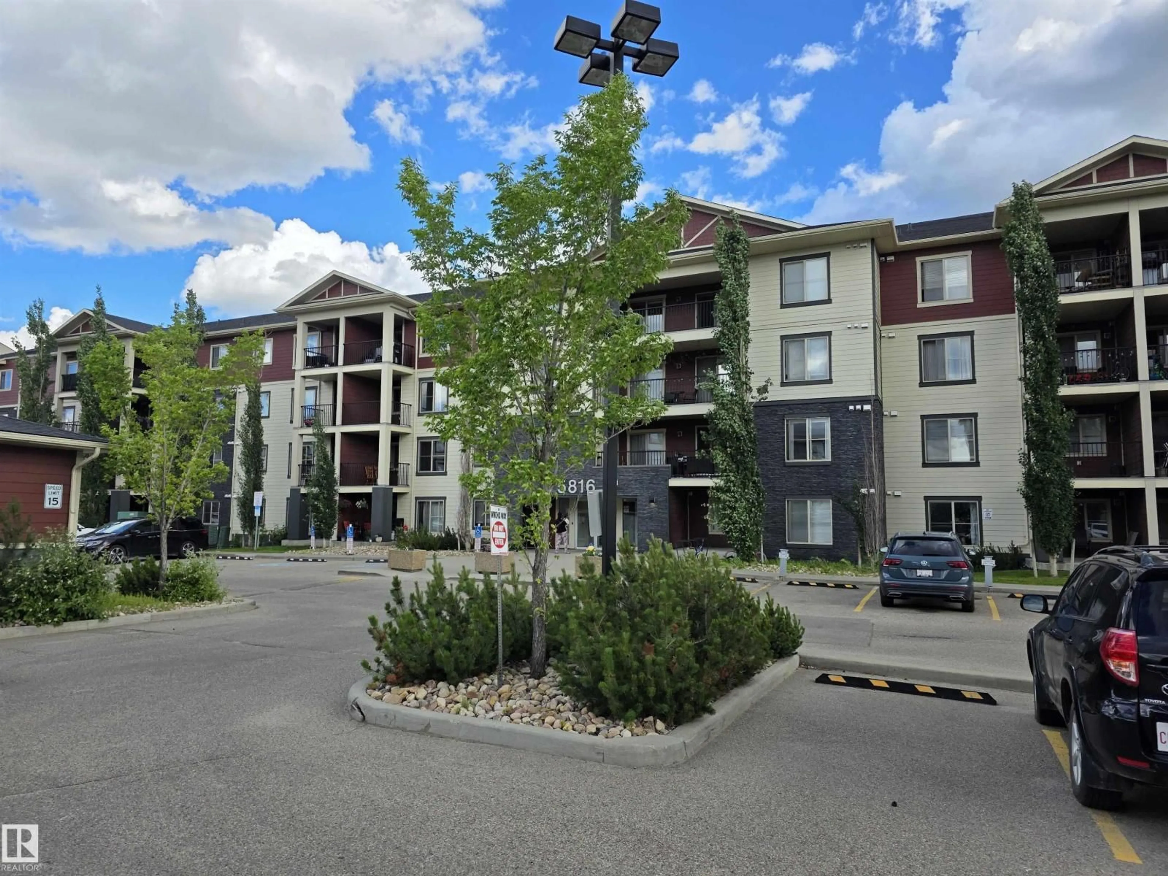 A pic from outside/outdoor area/front of a property/back of a property/a pic from drone, unknown for 319 - 5816 MULLEN PL, Edmonton Alberta T6R0W3