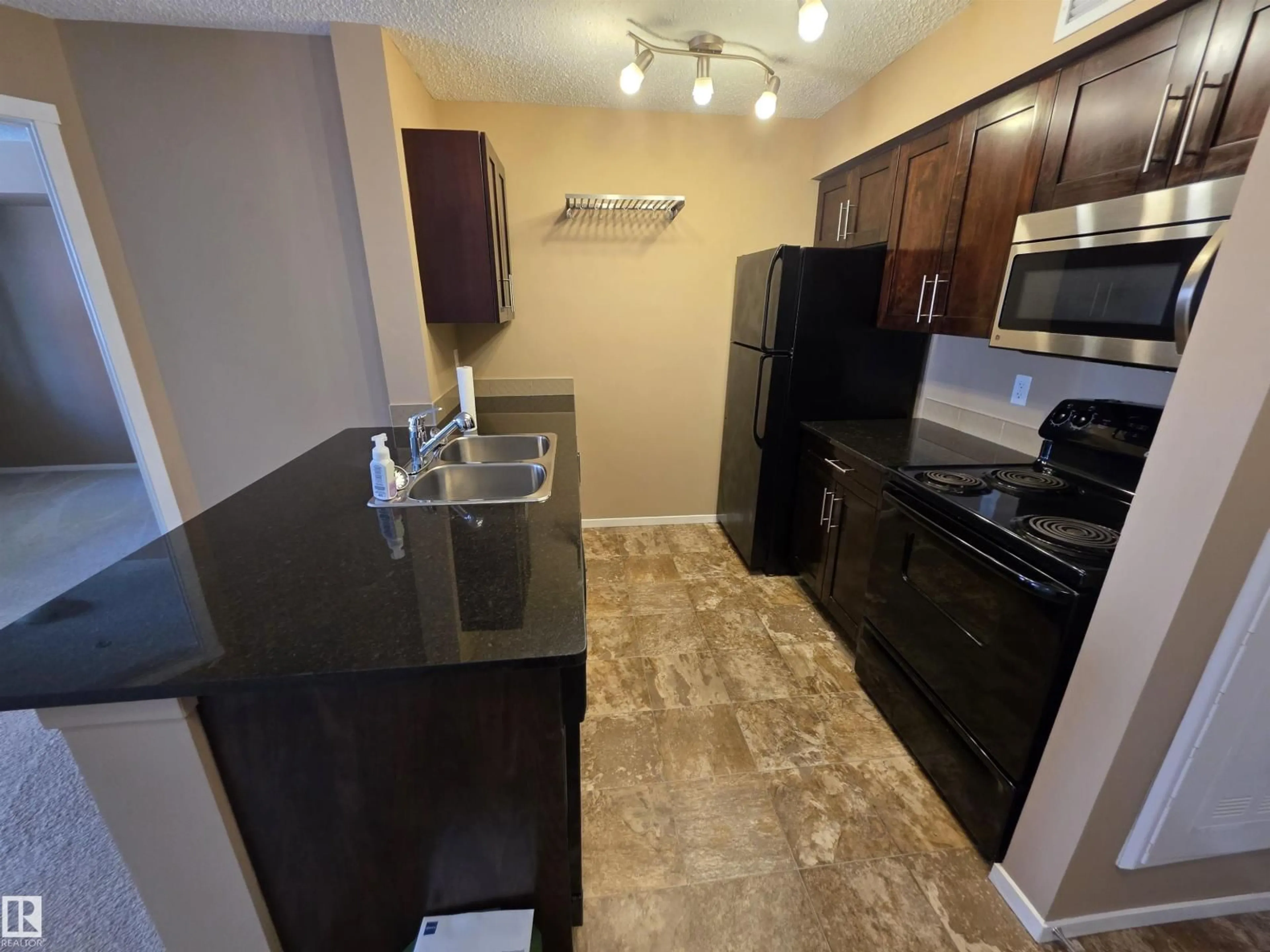 Standard kitchen, unknown for 319 - 5816 MULLEN PL, Edmonton Alberta T6R0W3