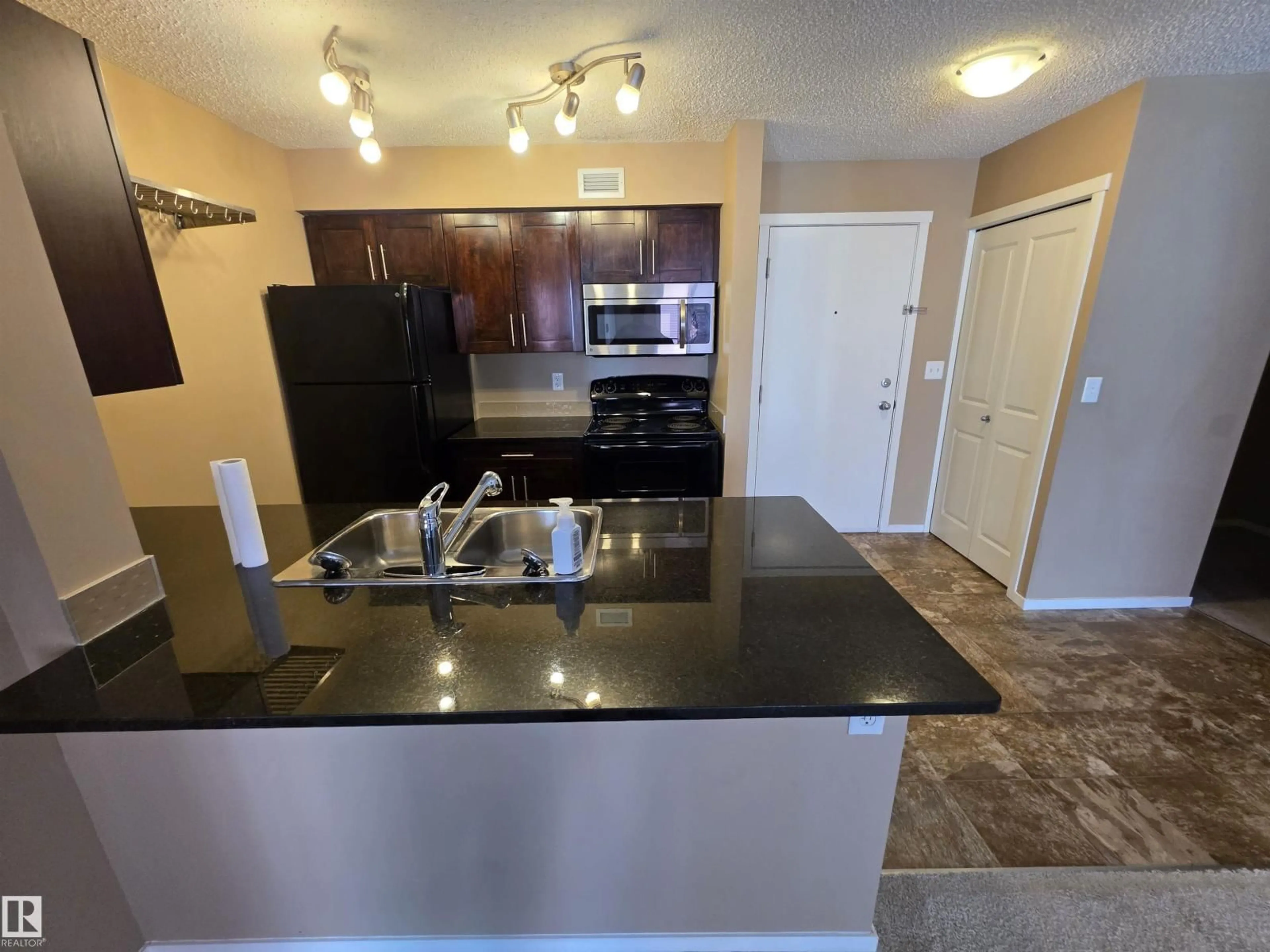 Standard kitchen, unknown for 319 - 5816 MULLEN PL, Edmonton Alberta T6R0W3