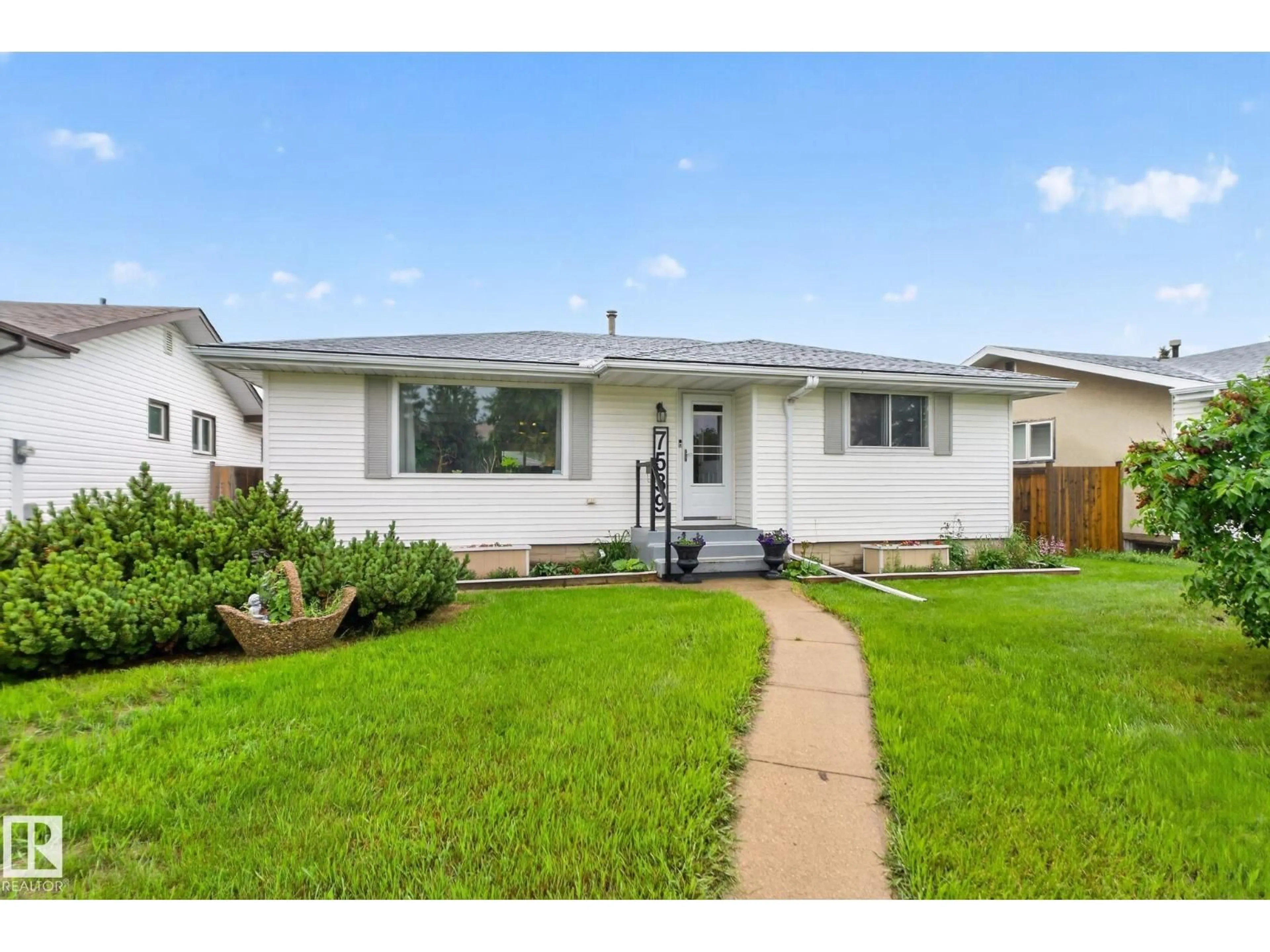 Home with vinyl exterior material, street for 7539 149A AV, Edmonton Alberta T5C2W8