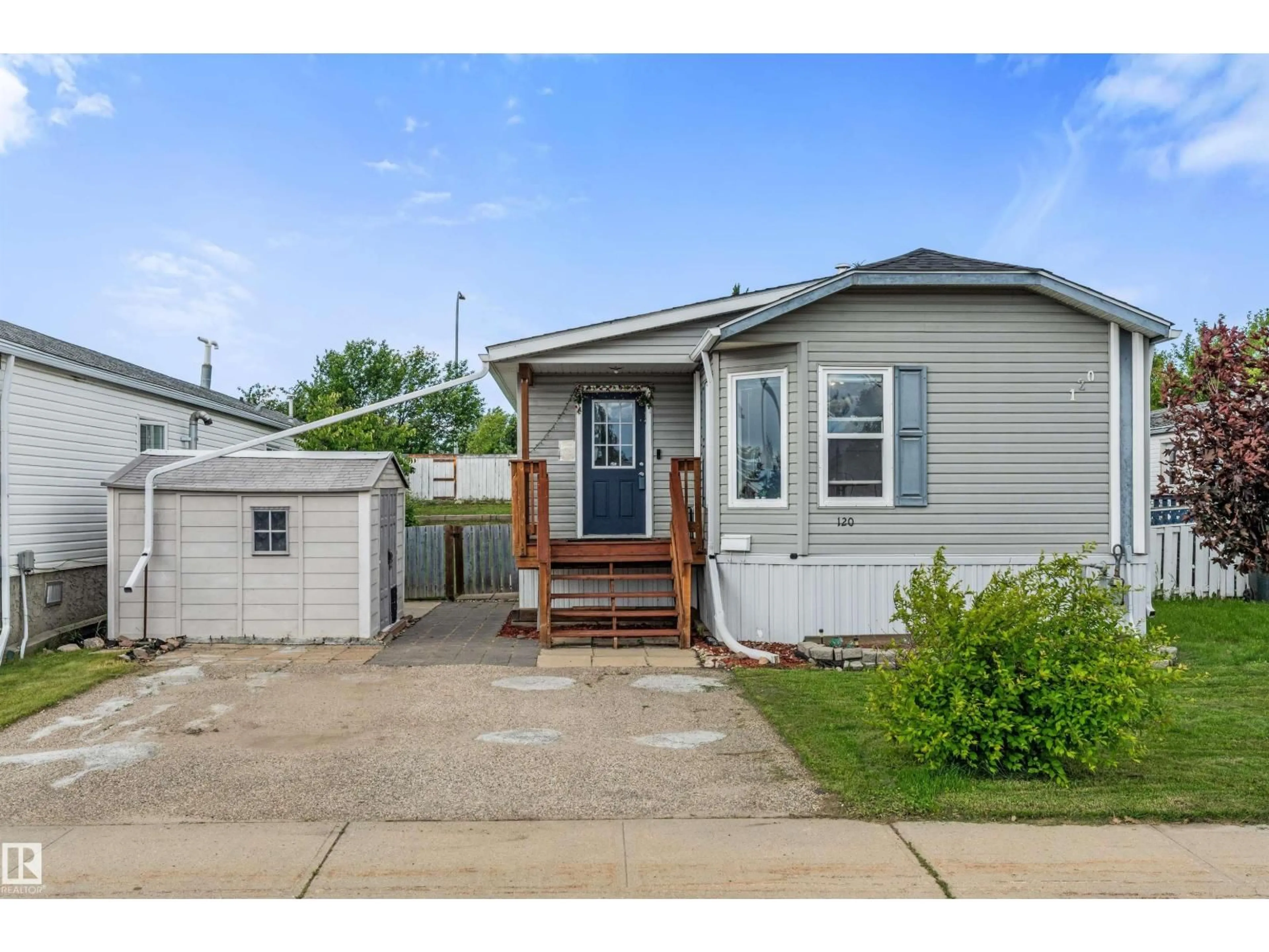 Home with vinyl exterior material, street for 120 SPRINGFIELD CR, Spruce Grove Alberta T7X3H8