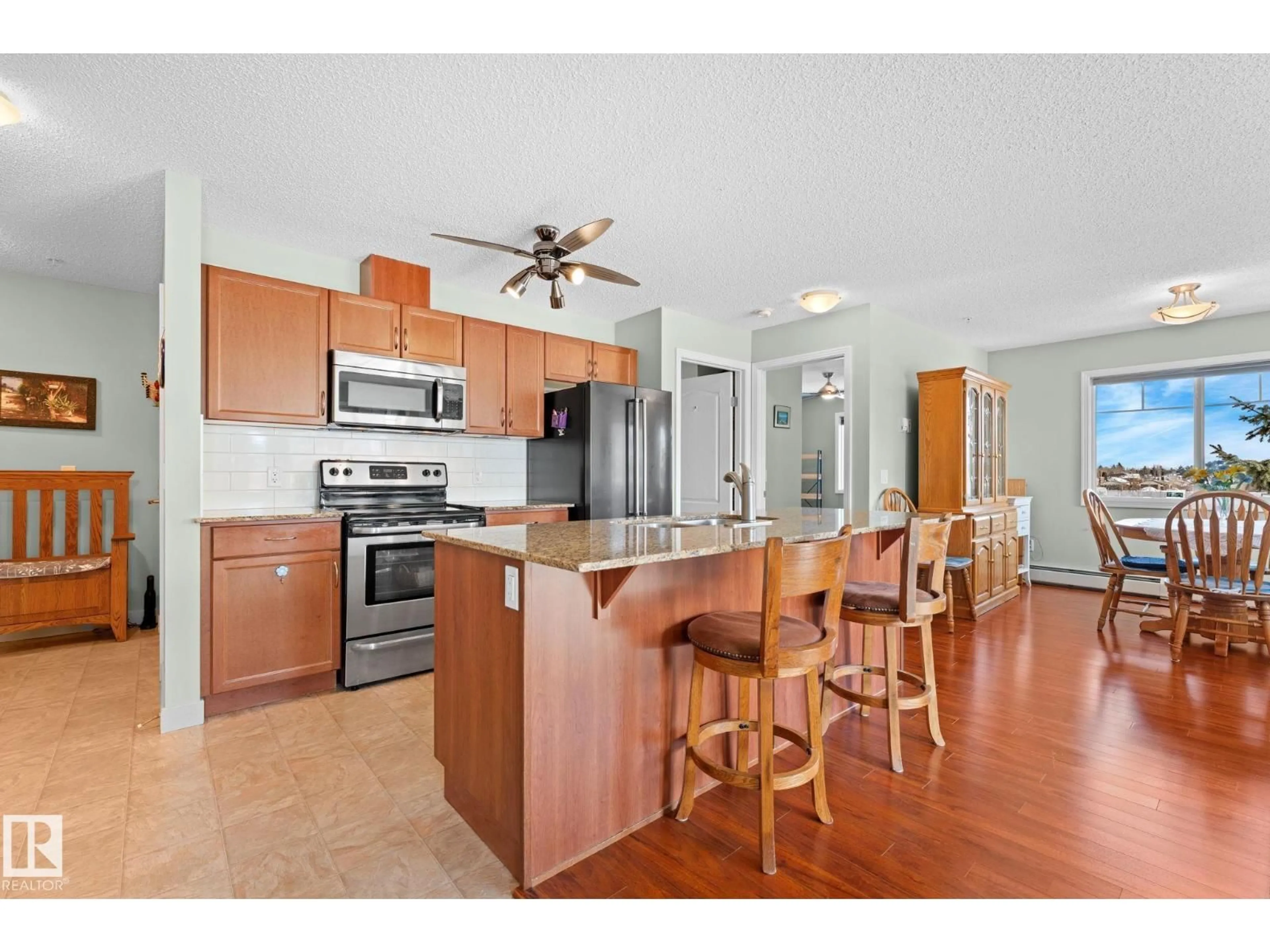 Open concept kitchen, ceramic/tile floor for #214 - 12650 142 AV, Edmonton Alberta T5X0J4