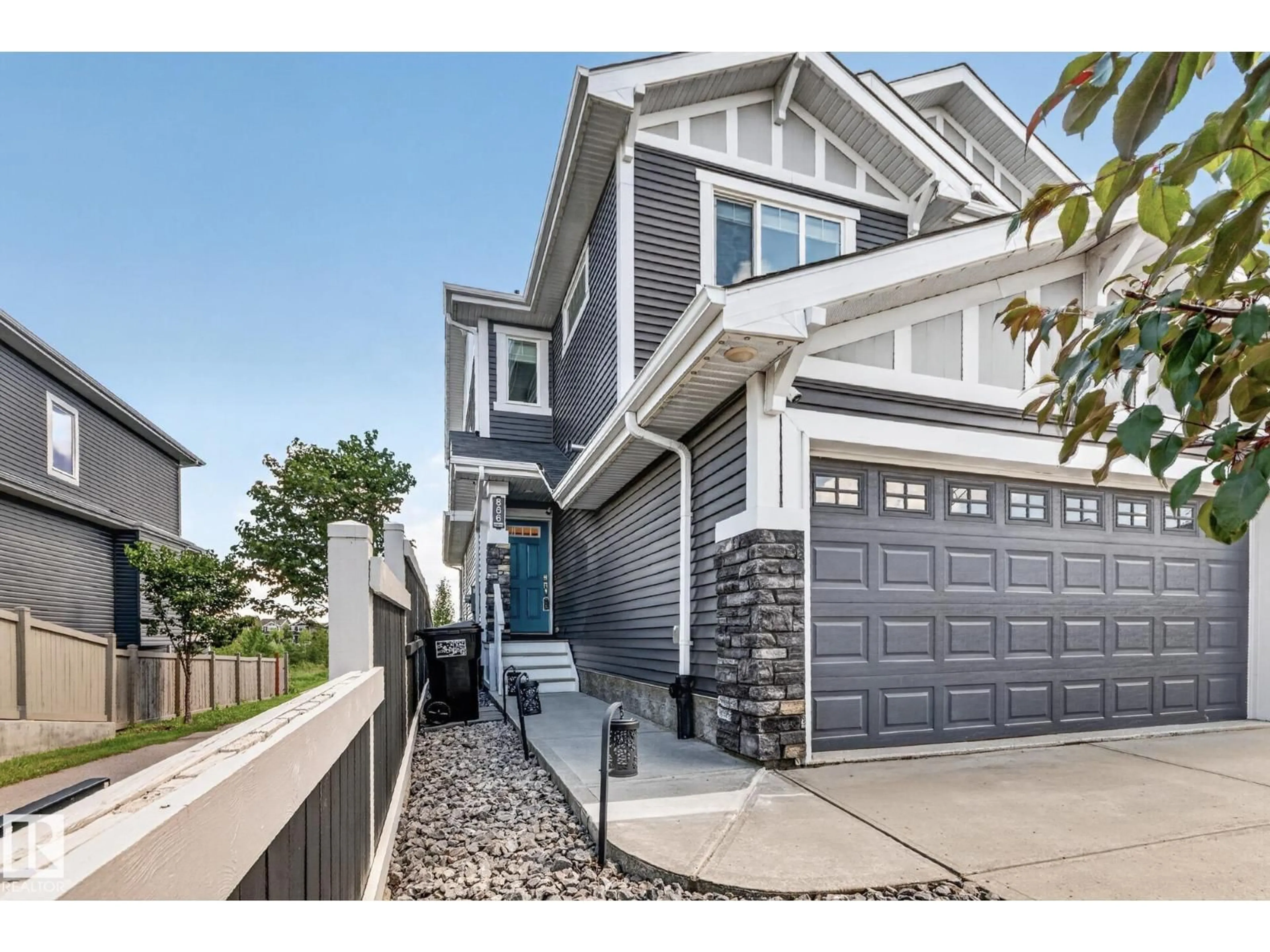 Home with vinyl exterior material, street for 866 EBBERS CR, Edmonton Alberta T5Y3V2