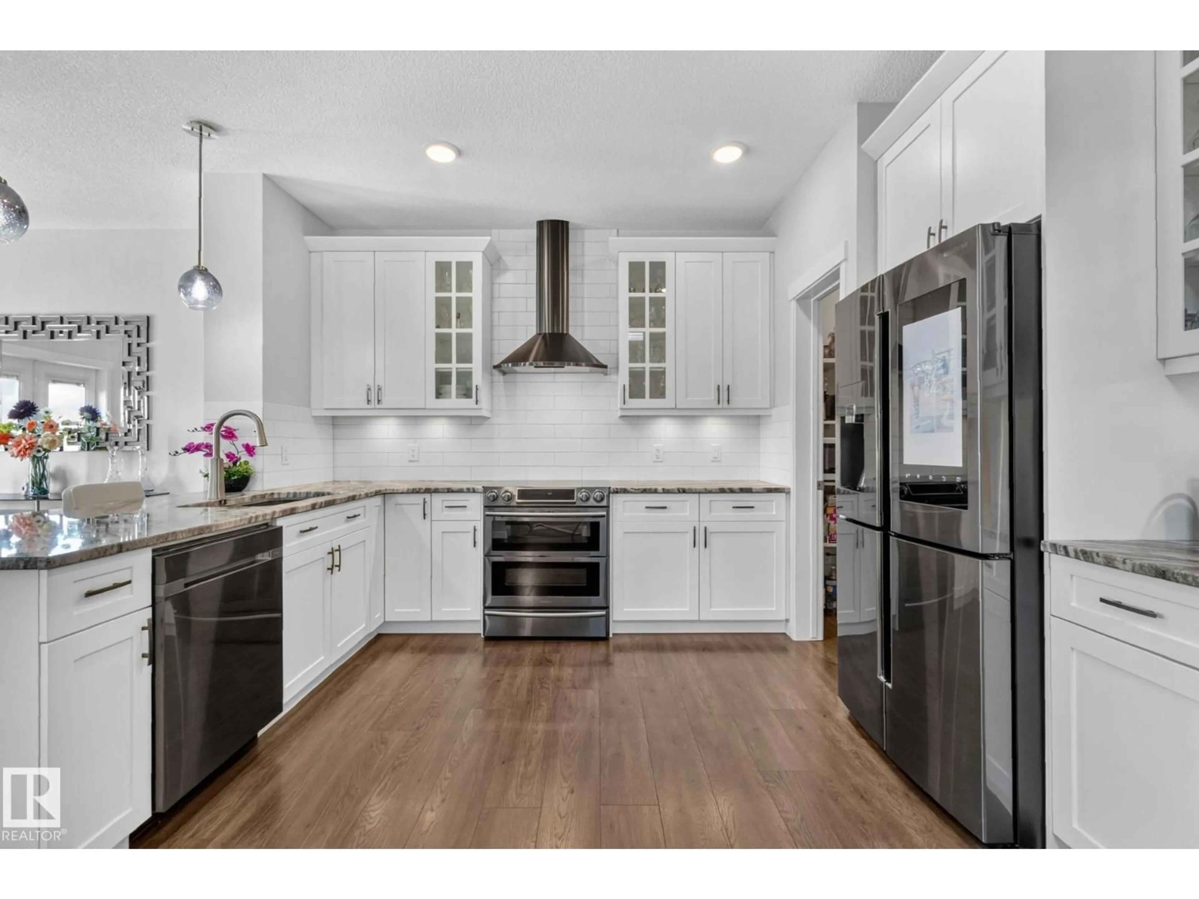 Open concept kitchen, unknown for 866 EBBERS CR, Edmonton Alberta T5Y3V2