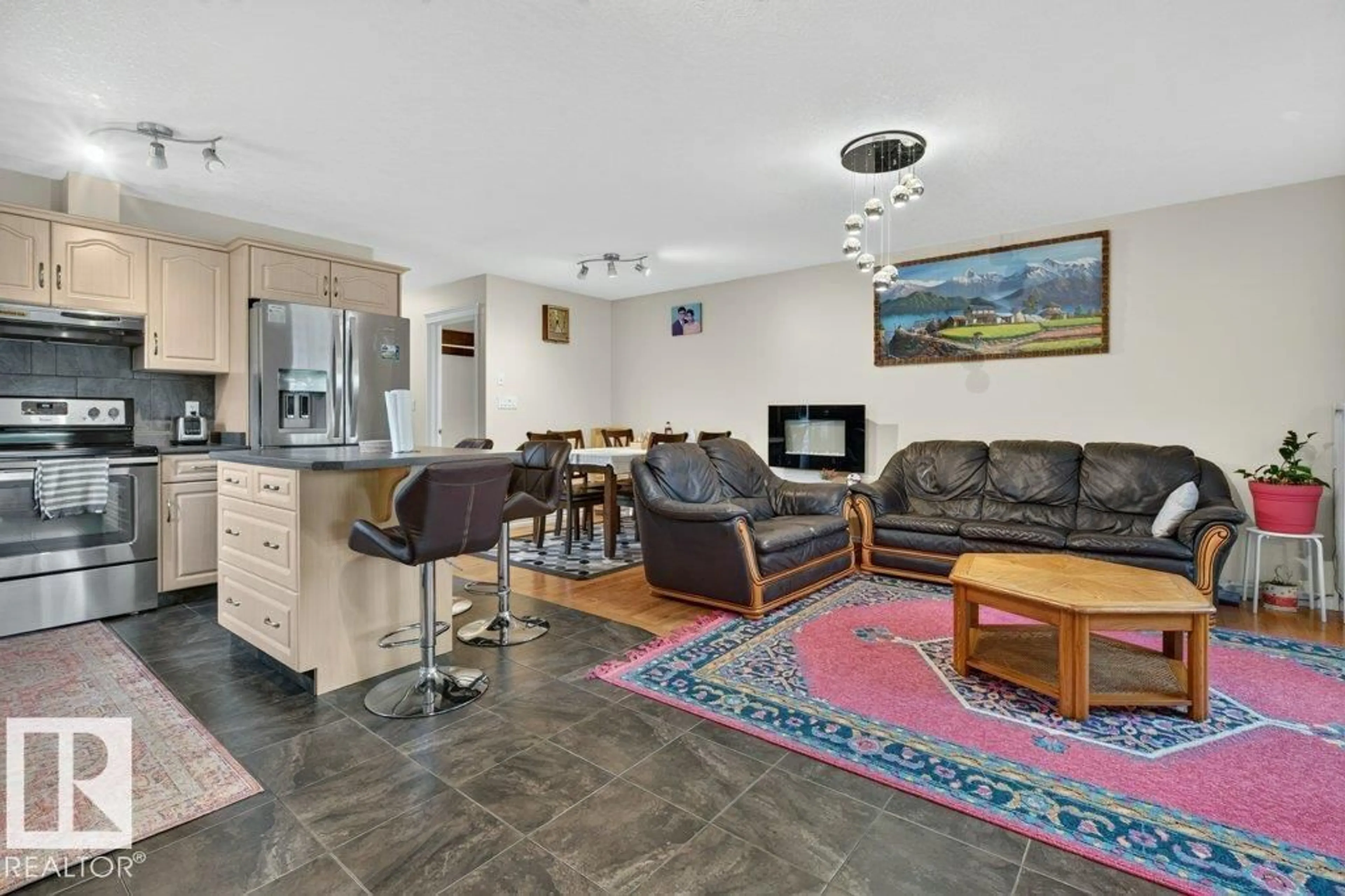 Living room with furniture, unknown for NW - 11330 101 ST, Edmonton Alberta T5G2A7