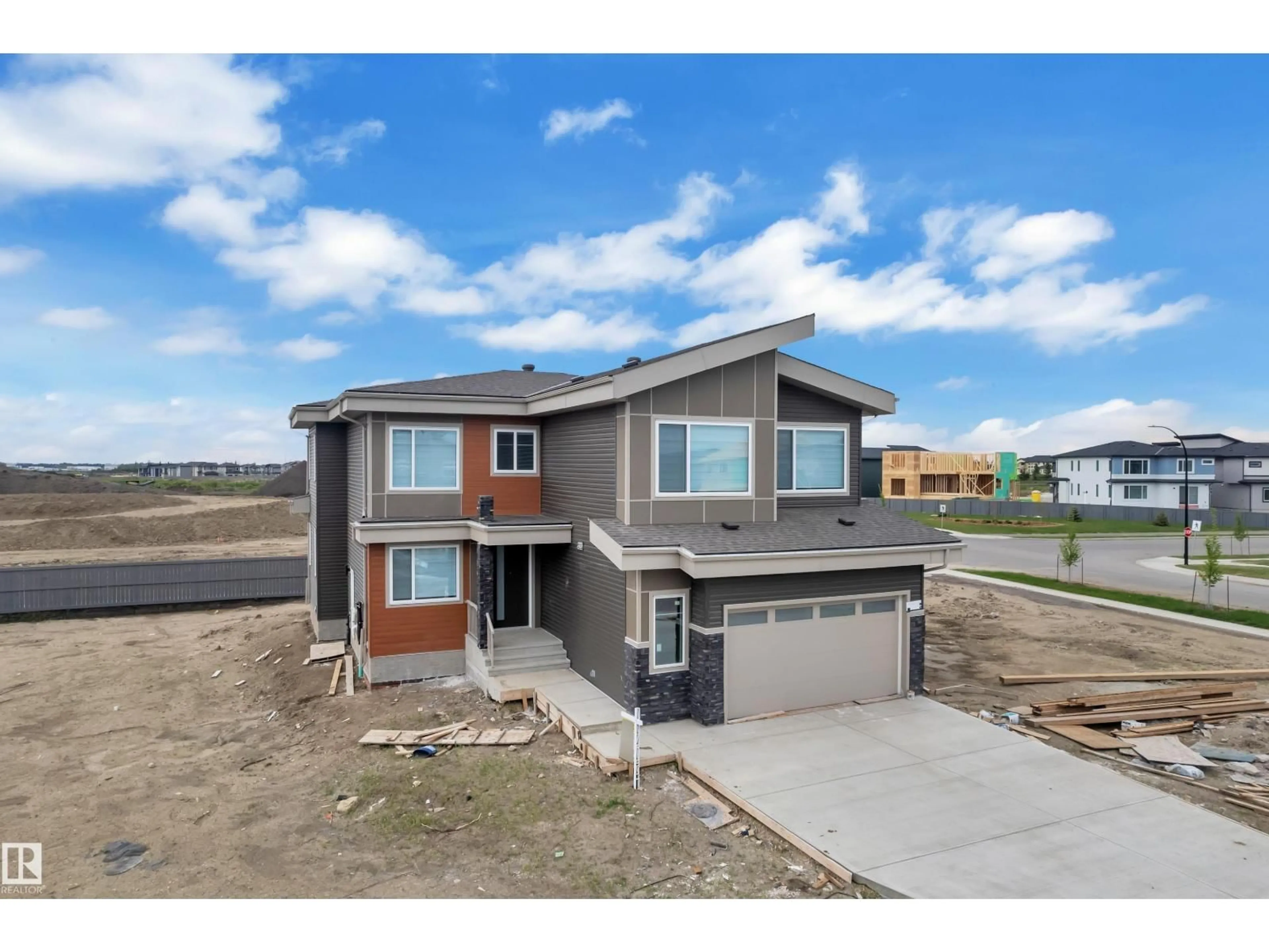 Home with brick exterior material, street for NE - 6408 26 ST, Rural Leduc County Alberta T4X2C1