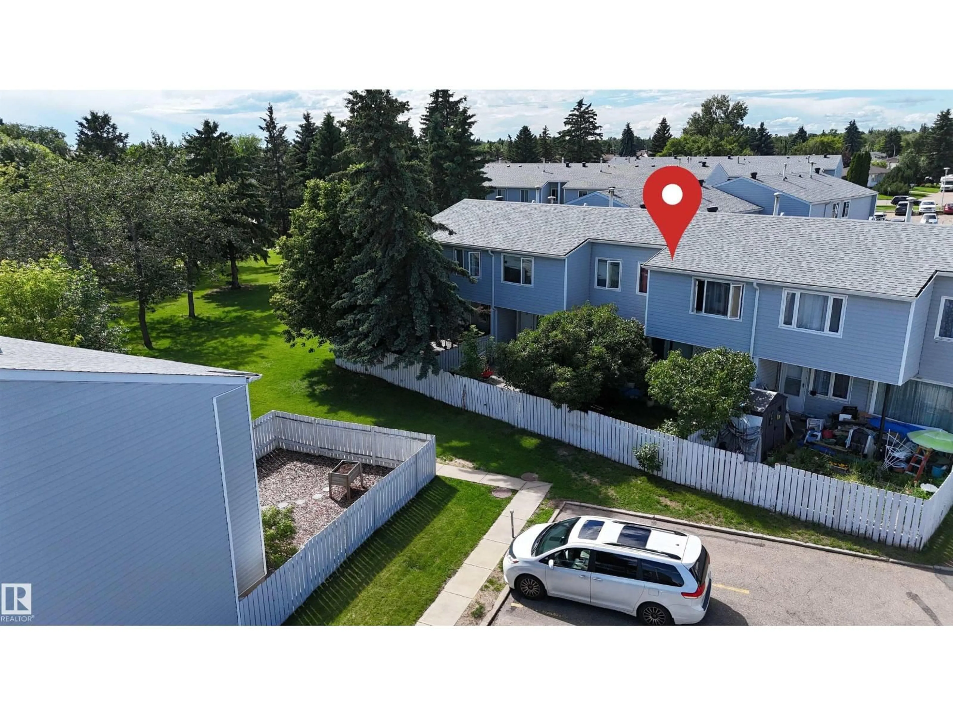 A pic from outside/outdoor area/front of a property/back of a property/a pic from drone, unknown for NW - 21 AMBERLY CO, Edmonton Alberta T6R3A3