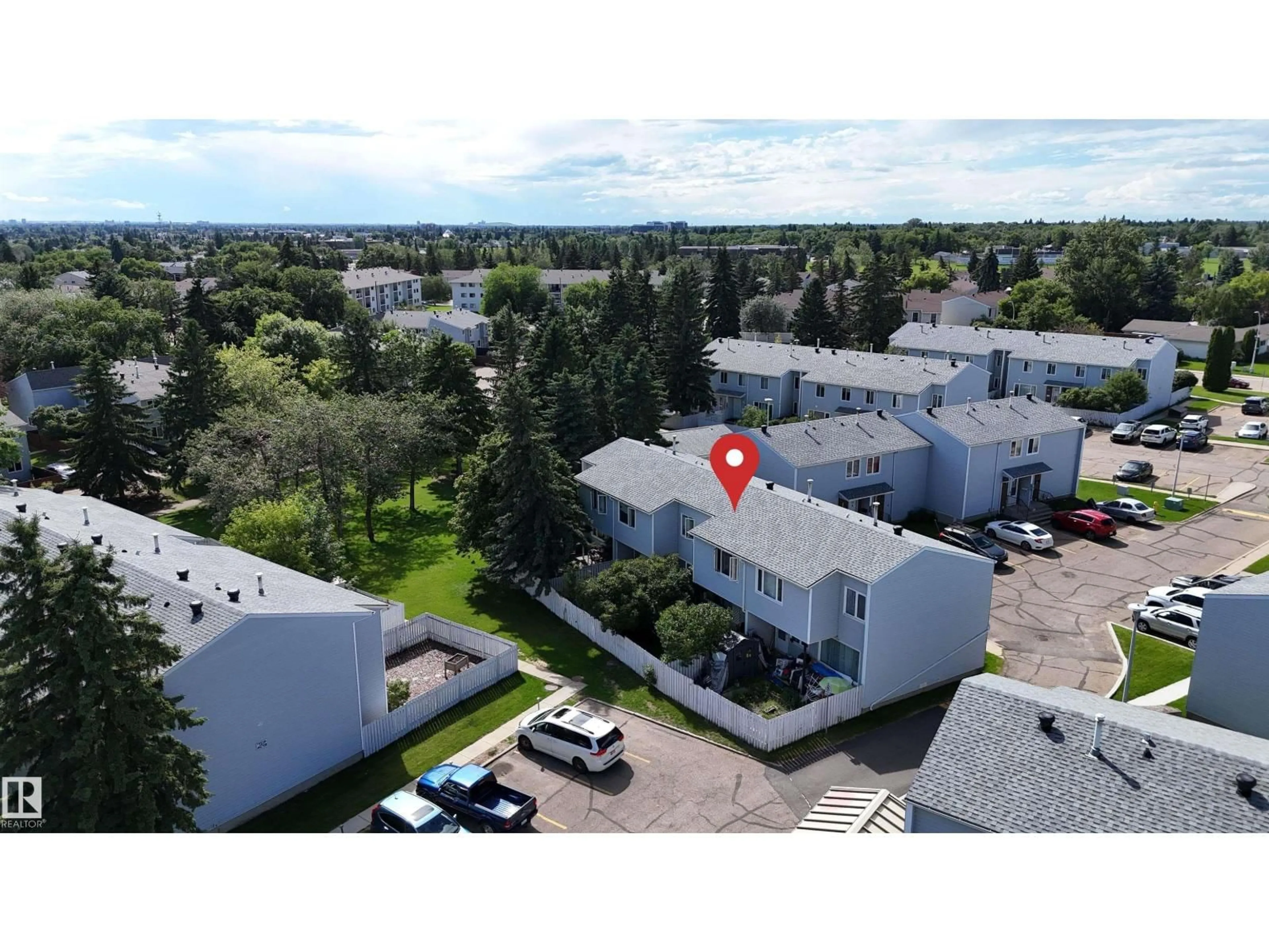A pic from outside/outdoor area/front of a property/back of a property/a pic from drone, unknown for NW - 21 AMBERLY CO, Edmonton Alberta T6R3A3