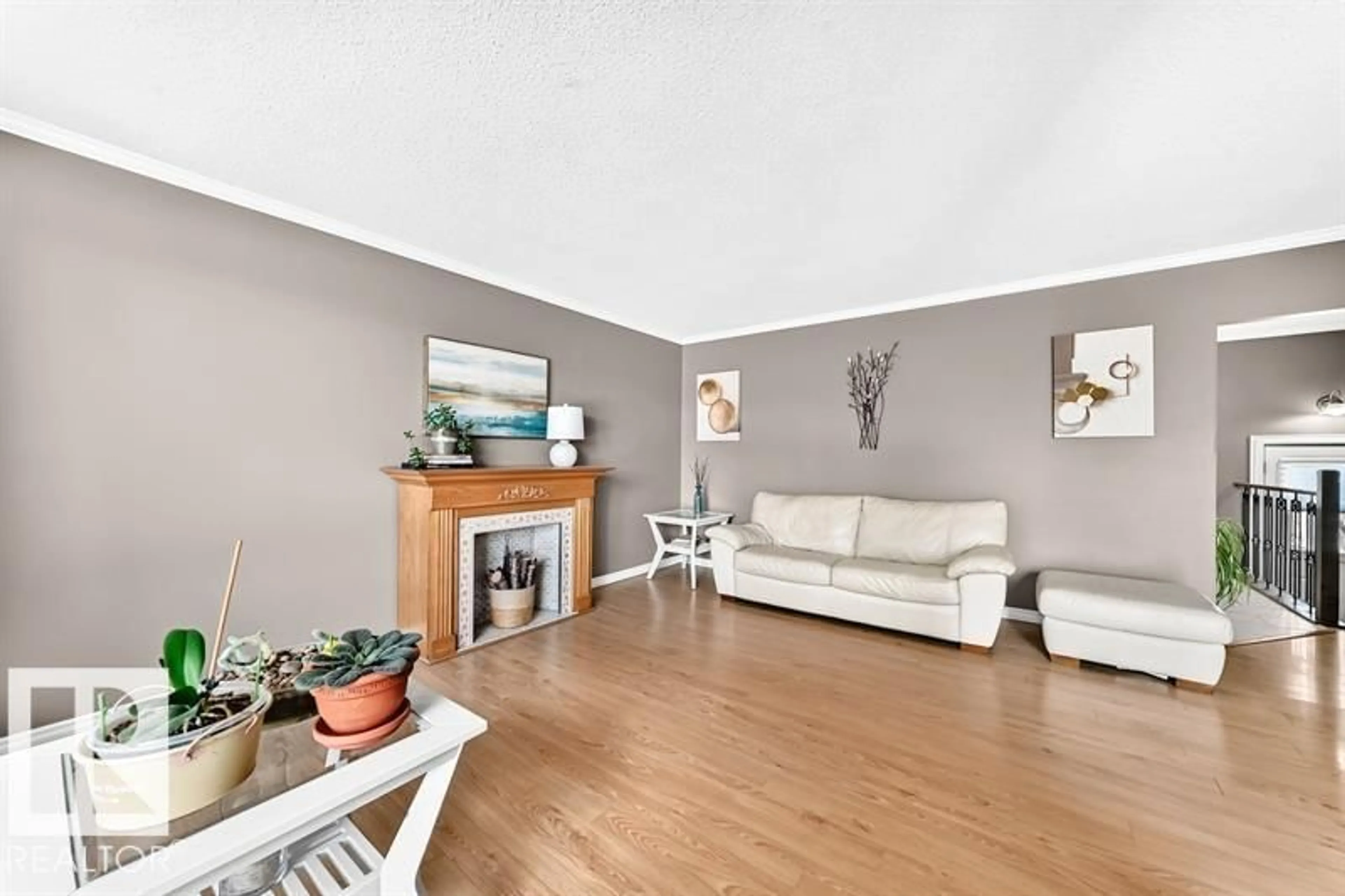 Living room with furniture, wood/laminate floor for 5408 47A ST, Wetaskiwin Alberta T9A1E8