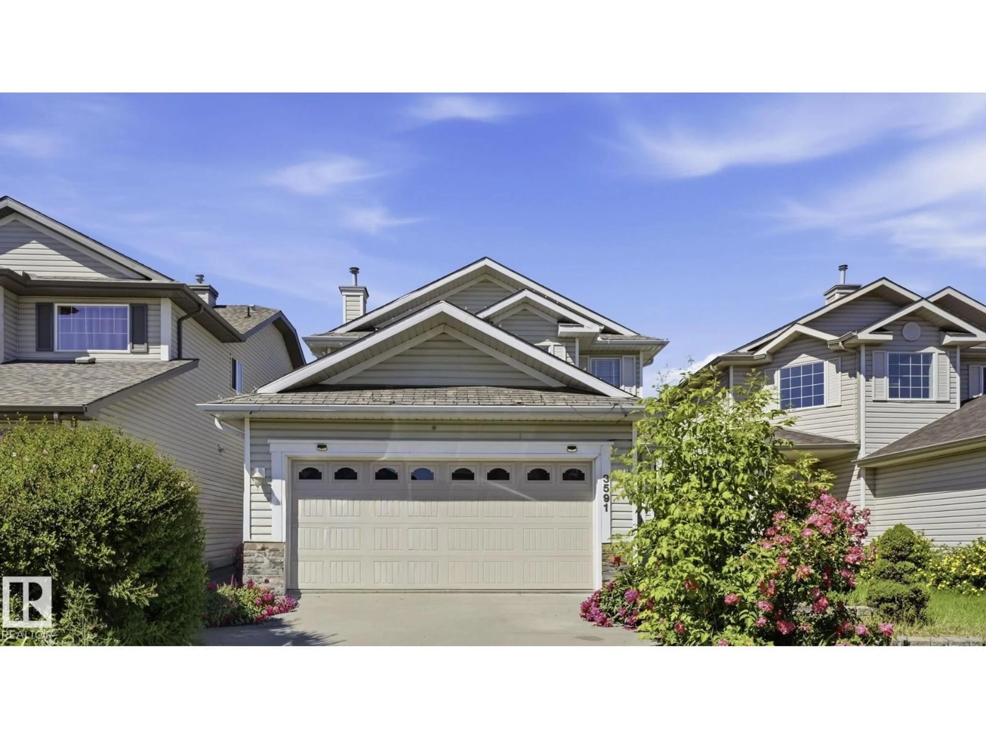 Home with vinyl exterior material, street for 3591 MCLEAN CR, Edmonton Alberta T6W1M5