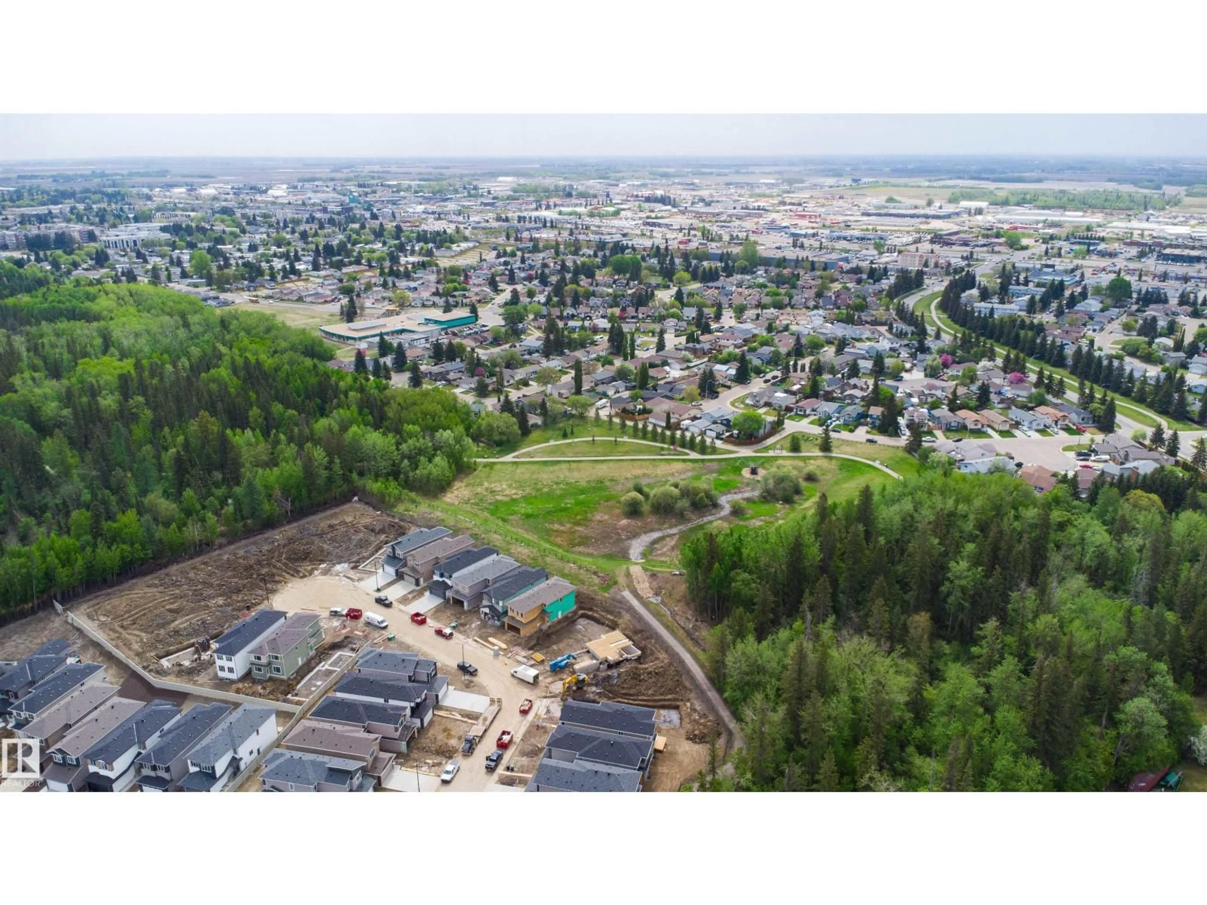 A pic from outside/outdoor area/front of a property/back of a property/a pic from drone, mountain view for 45 MEADOWGROVE LN, Spruce Grove Alberta T7X0W2