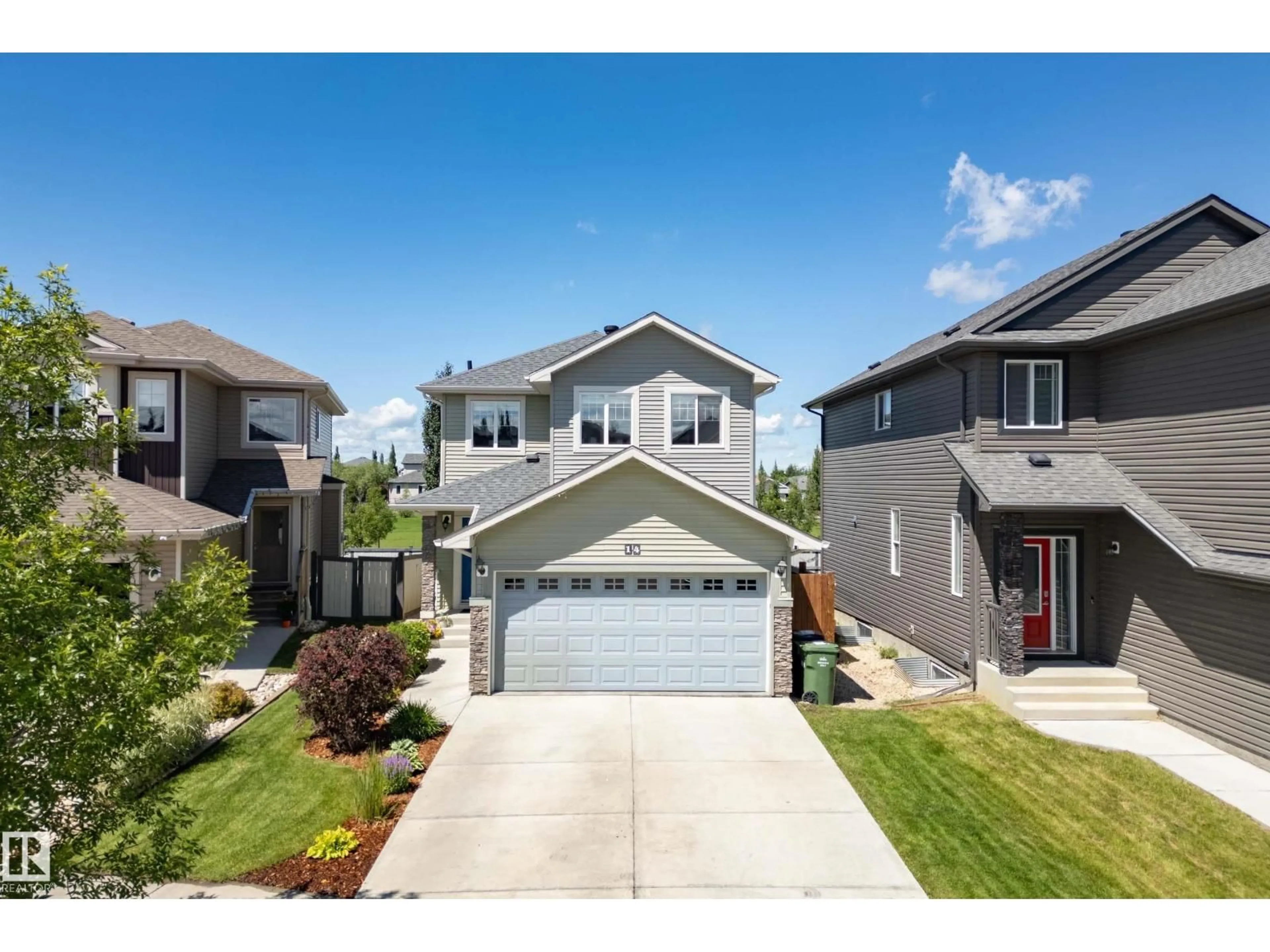 Home with vinyl exterior material, street for 14 MOBERG CL, Leduc Alberta T9E1E5