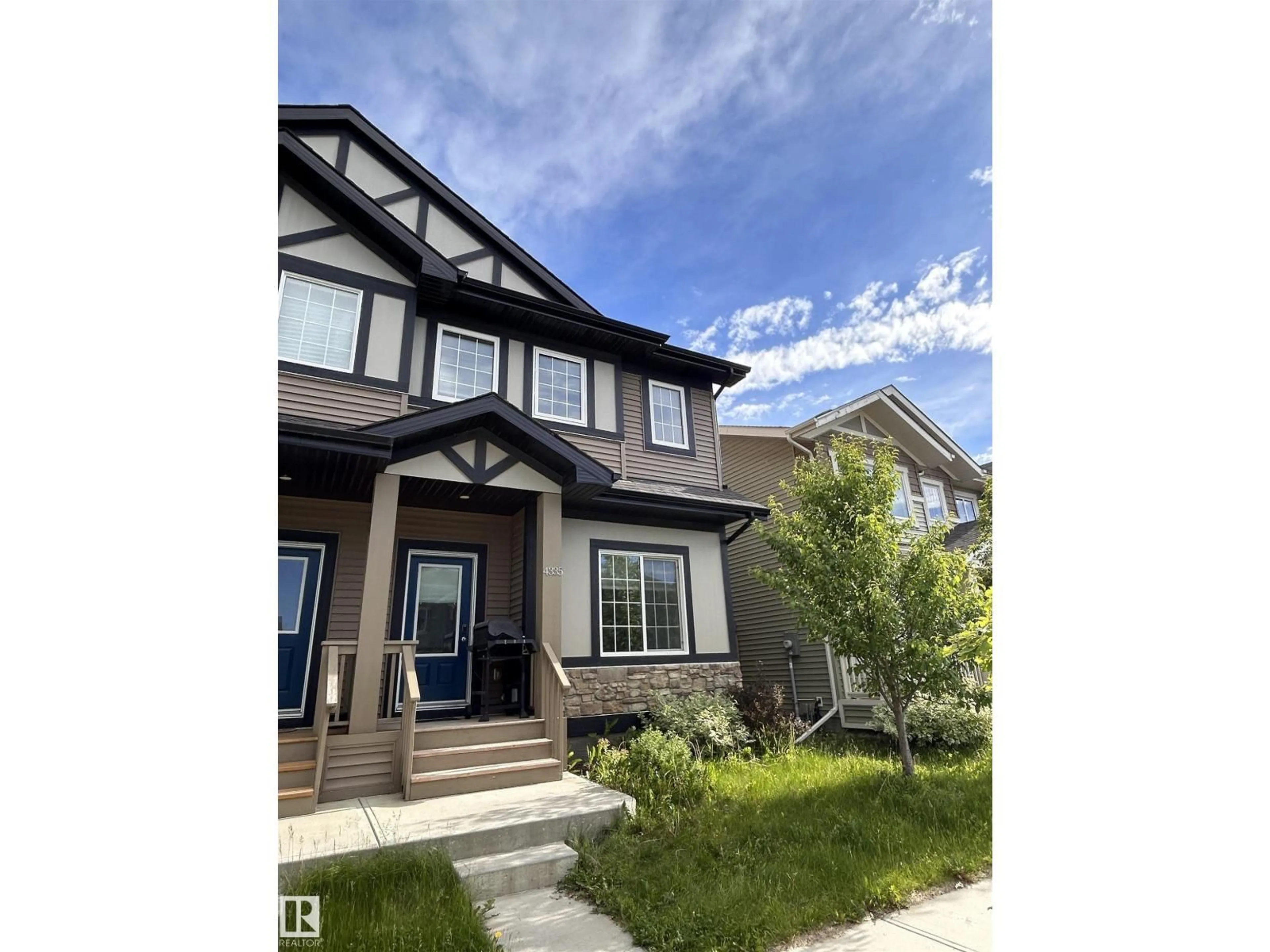 Home with vinyl exterior material, street for 4335 COOKE LN, Edmonton Alberta T6W4M7