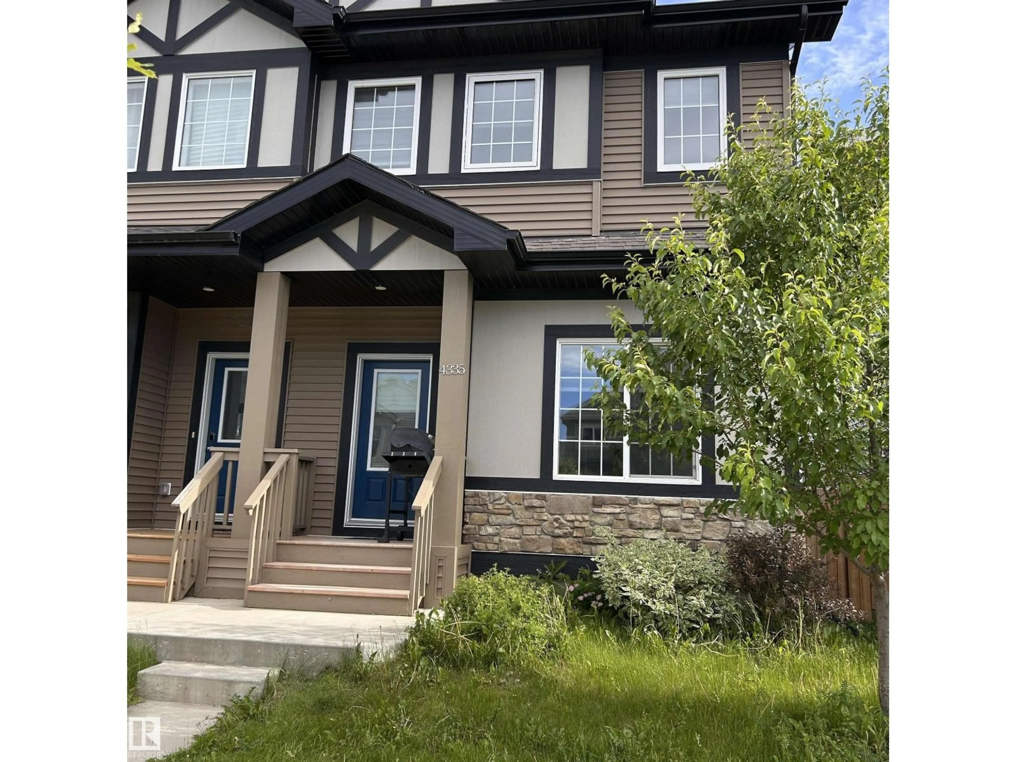 Home with vinyl exterior material, street for 4335 COOKE LN, Edmonton Alberta T6W4M7