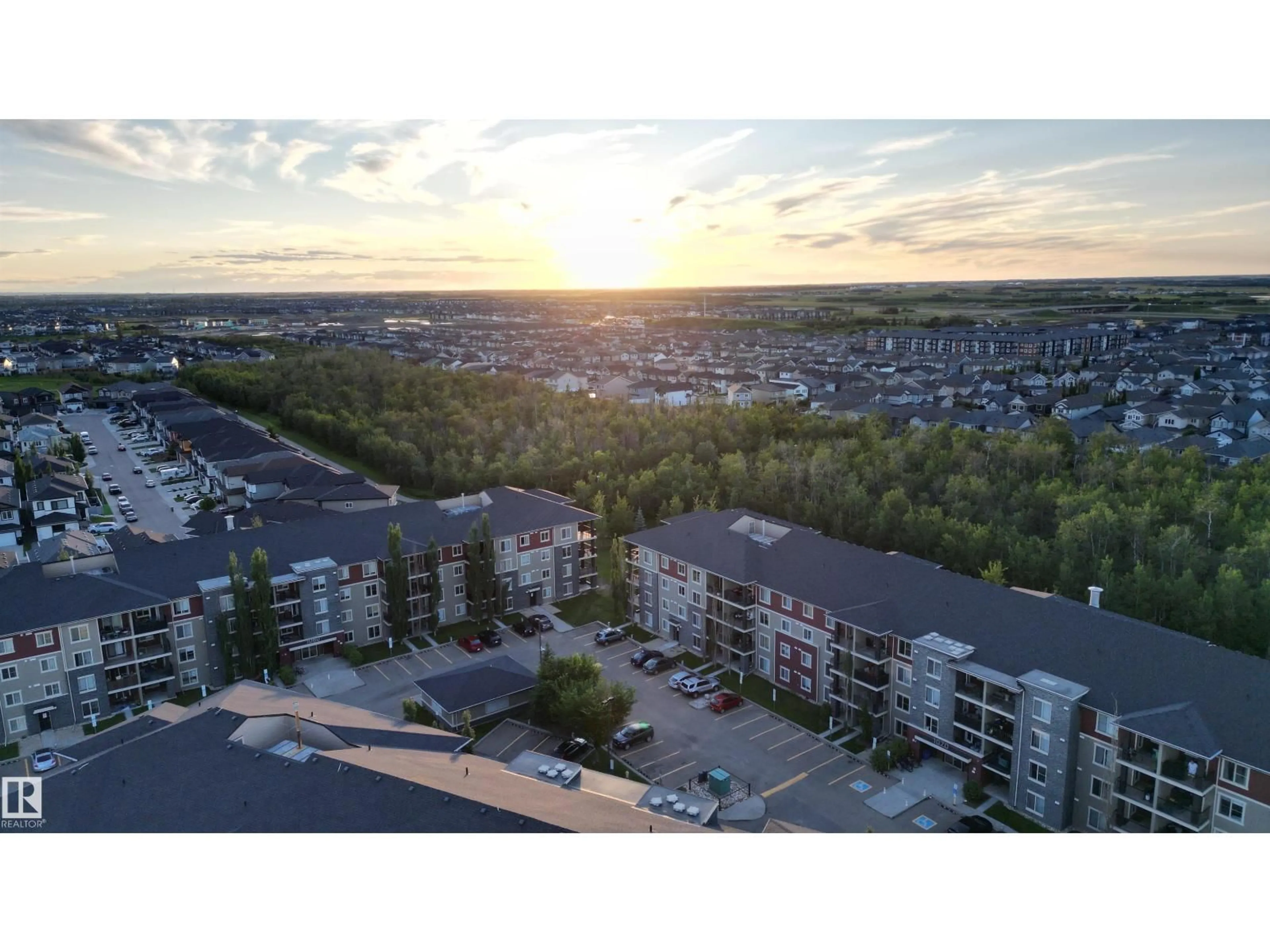 A pic from outside/outdoor area/front of a property/back of a property/a pic from drone, mountain view for 114 - 1080 MCCONACHIE BV, Edmonton Alberta T5Y0X2