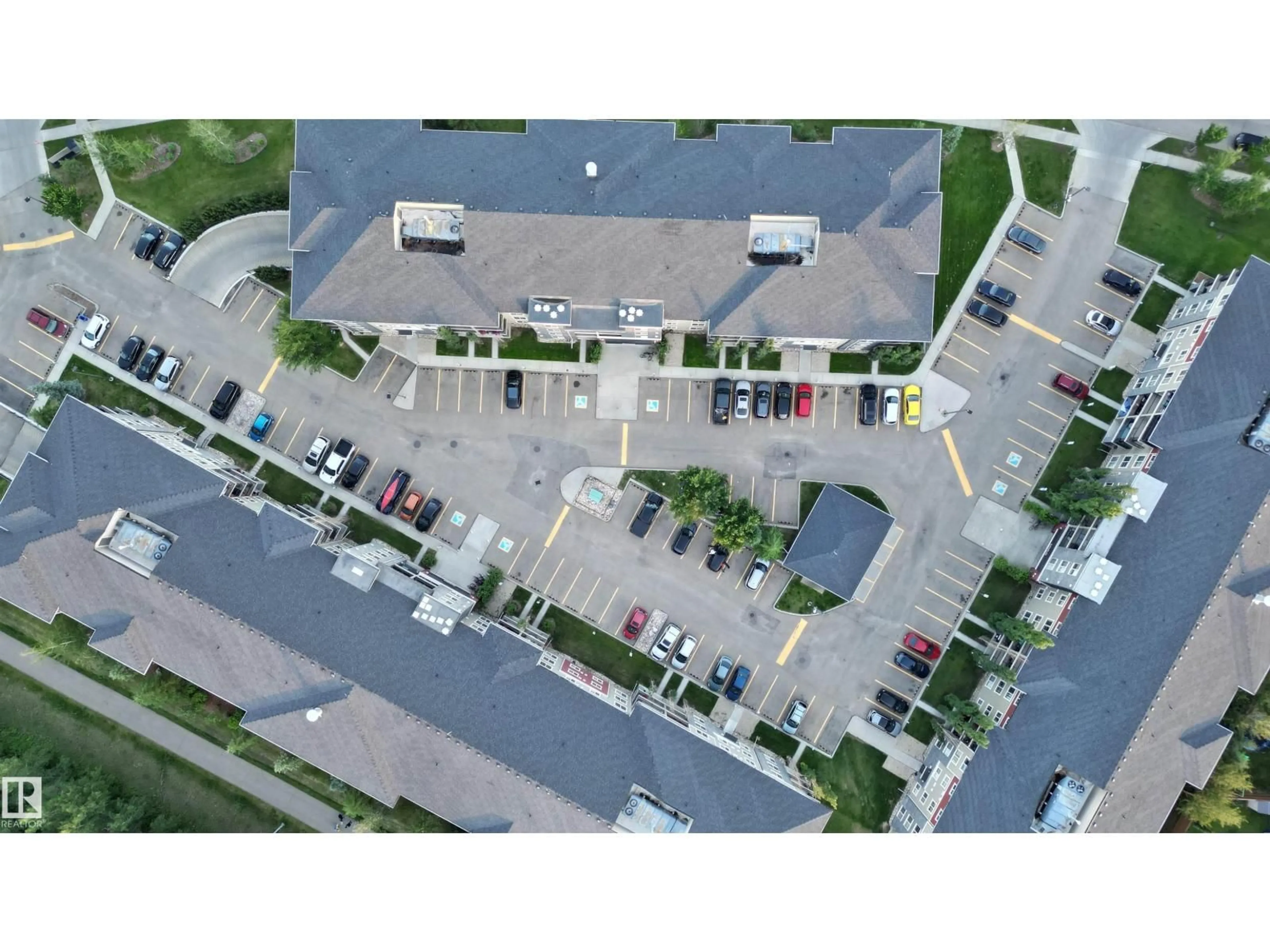 A pic from outside/outdoor area/front of a property/back of a property/a pic from drone, street for 114 - 1080 MCCONACHIE BV, Edmonton Alberta T5Y0X2