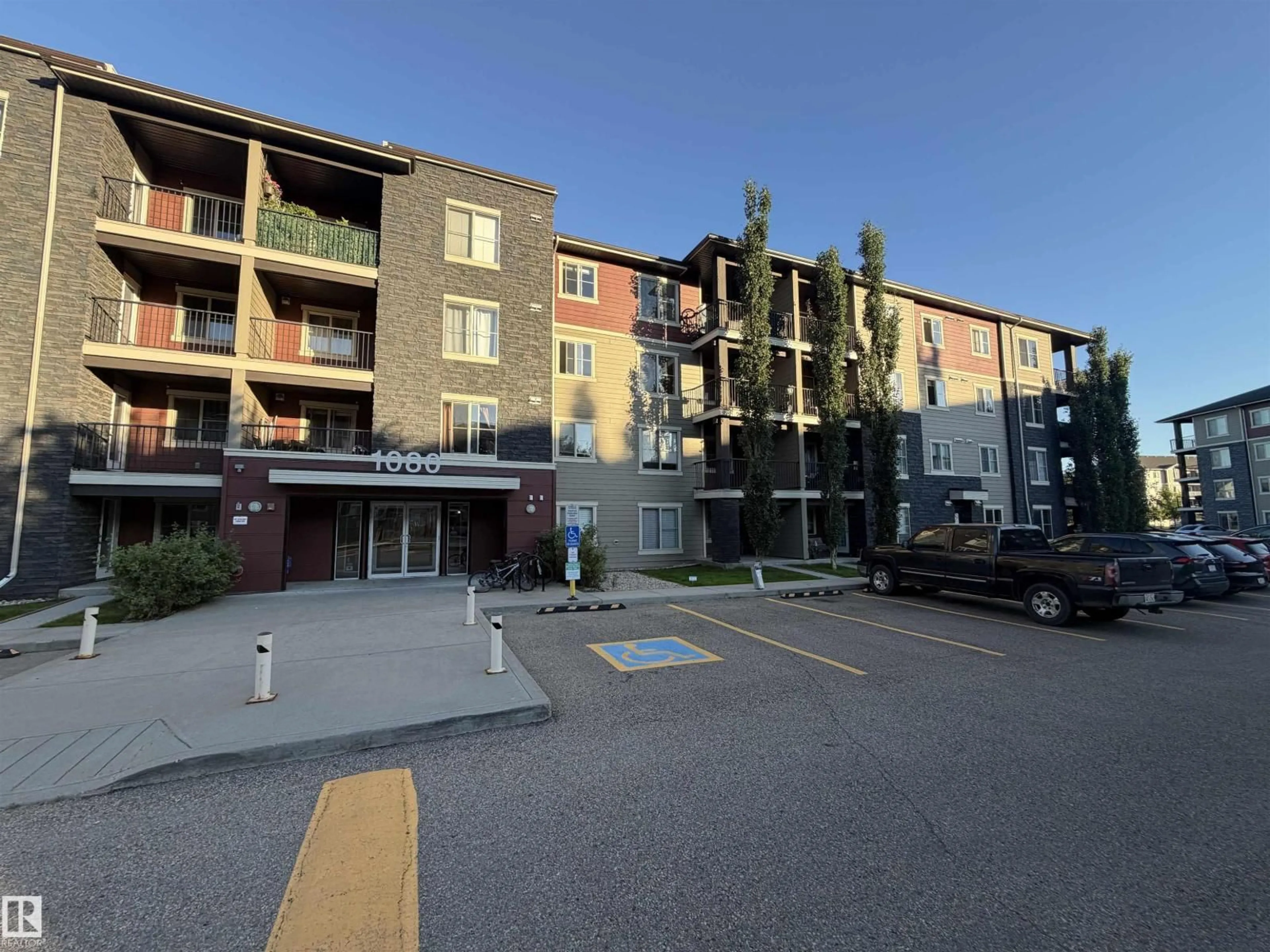 A pic from outside/outdoor area/front of a property/back of a property/a pic from drone, building for 114 - 1080 MCCONACHIE BV, Edmonton Alberta T5Y0X2