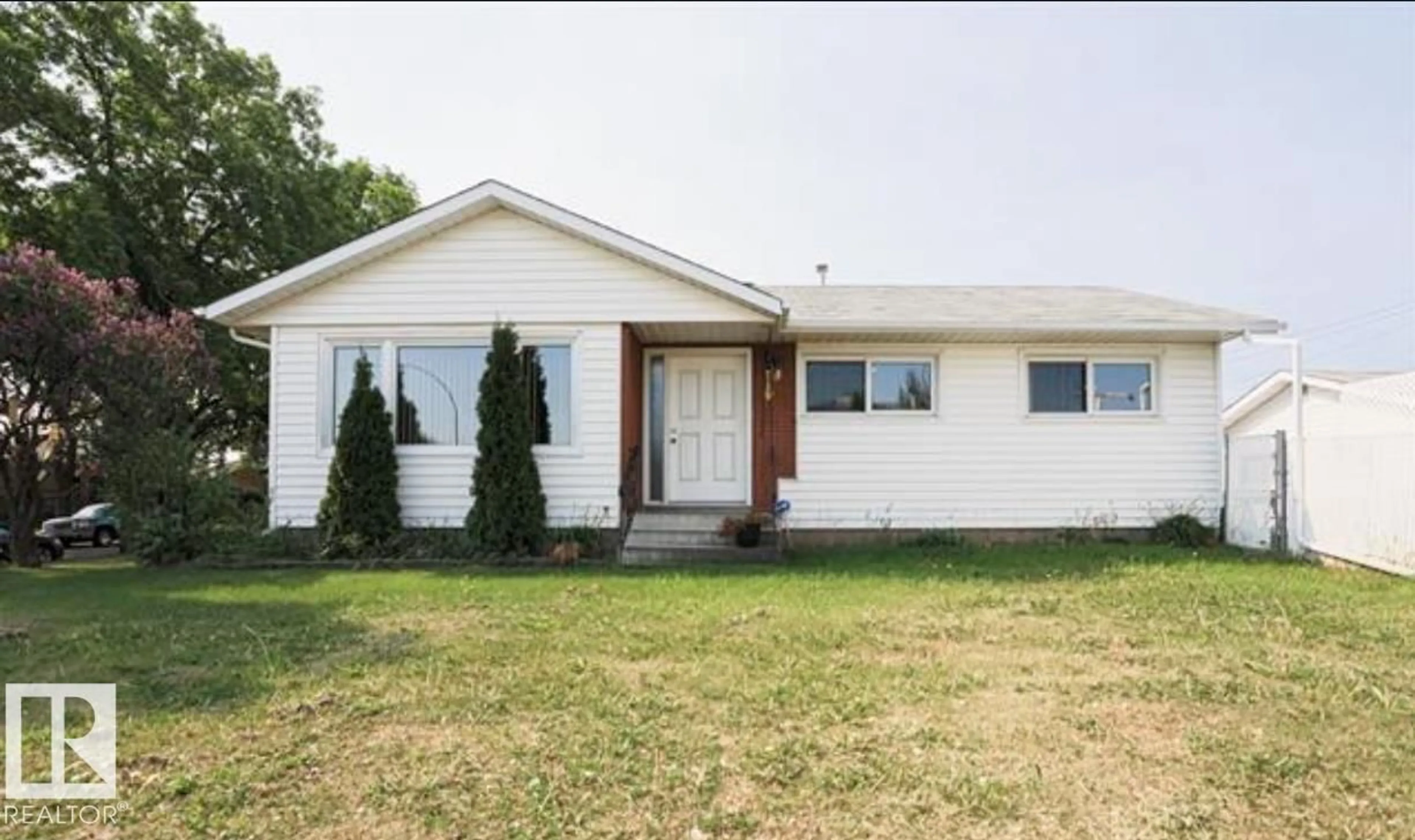 Home with vinyl exterior material, street for NW - 12238 48 ST, Edmonton Alberta T5W2Z4
