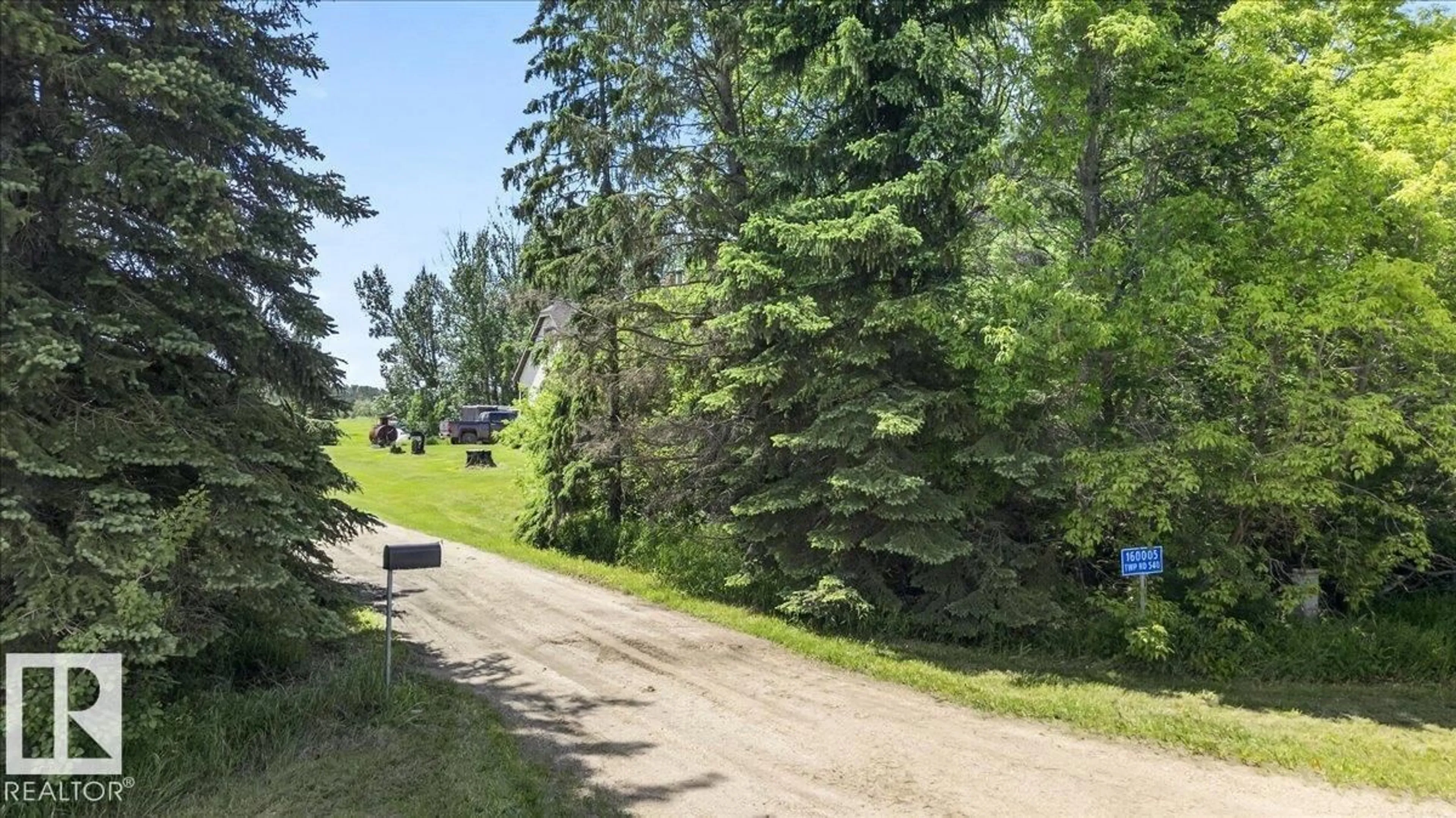 A pic from outside/outdoor area/front of a property/back of a property/a pic from drone, forest/trees view for 160005 TWP 540, Rural Lamont County Alberta T0B3H0