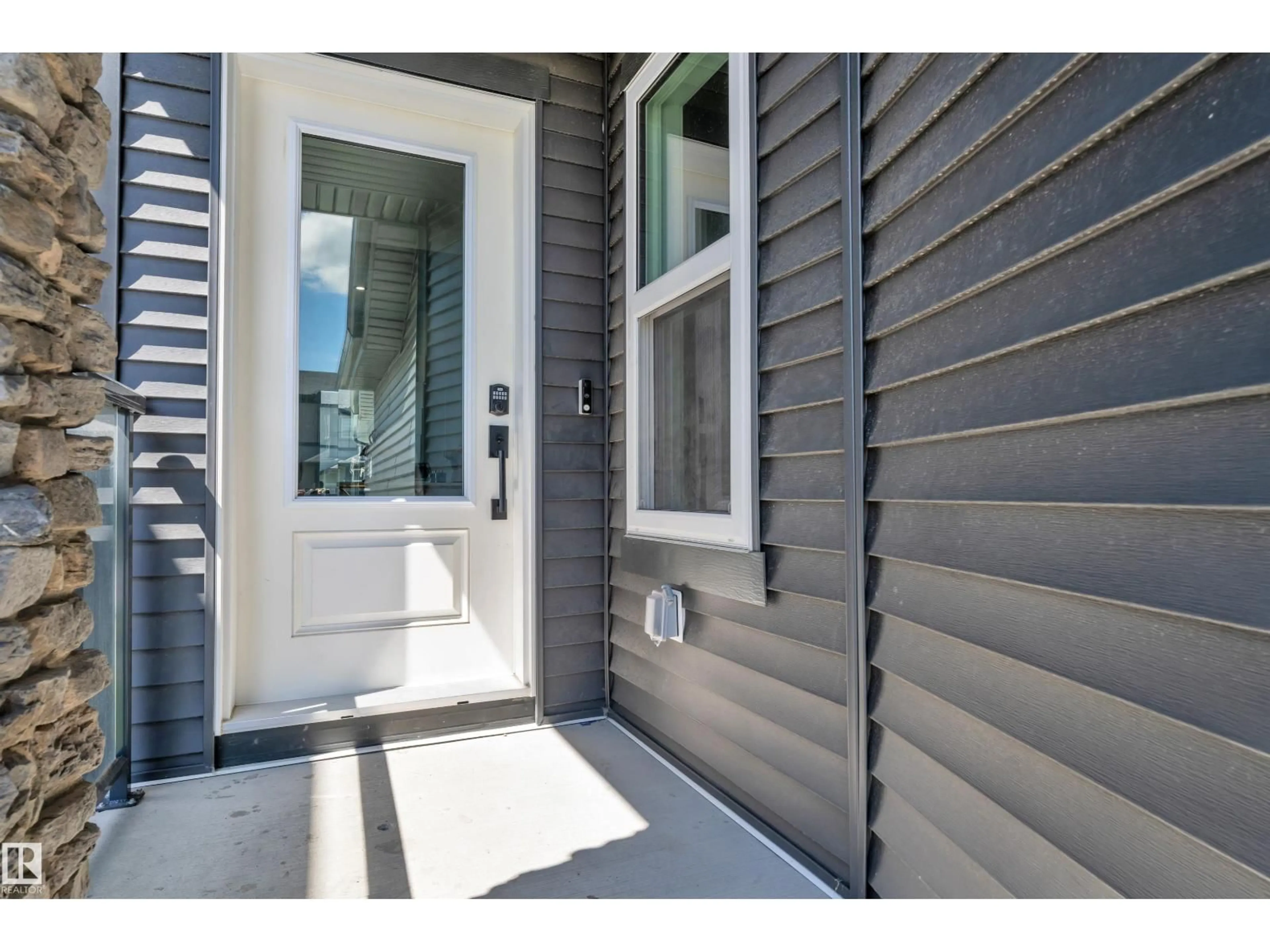 Home with vinyl exterior material, street for NW - 16816 49 ST, Edmonton Alberta T5Y4G9