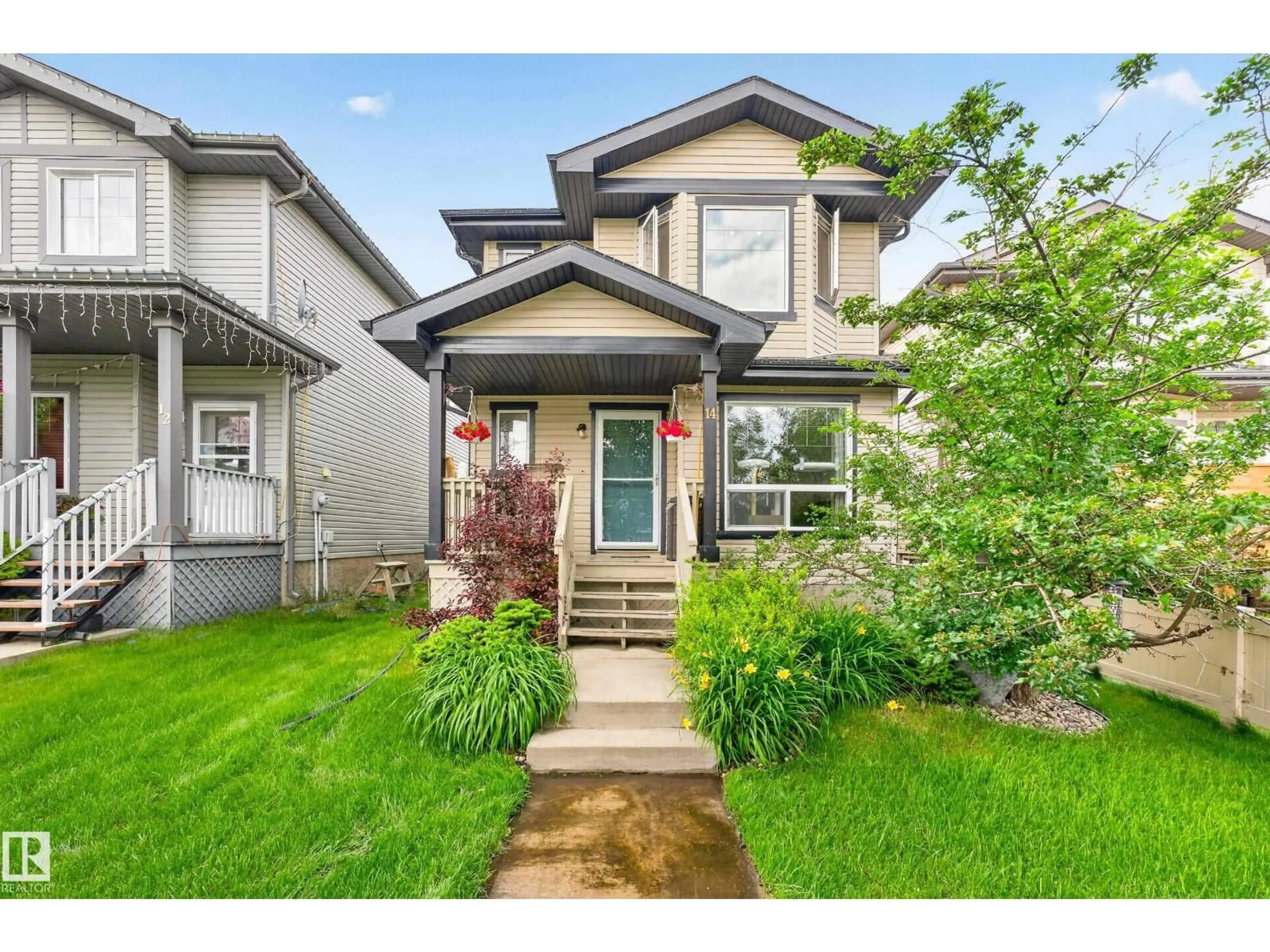 Home with vinyl exterior material, street for 14 BIRCHGLEN CR, Leduc Alberta T9E0C5