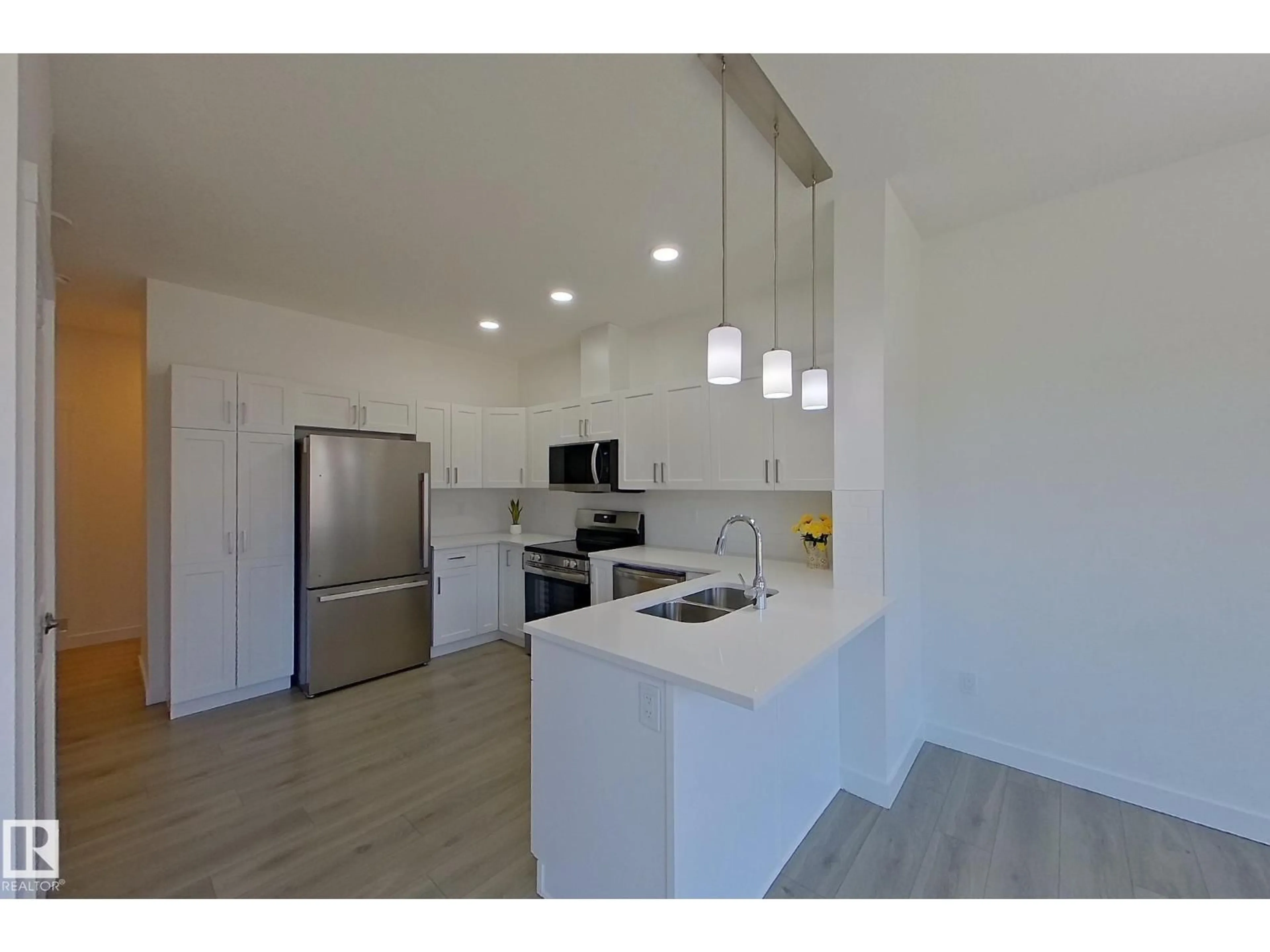 Open concept kitchen, unknown for 54 - 2710 66 ST, Edmonton Alberta T6H3H4