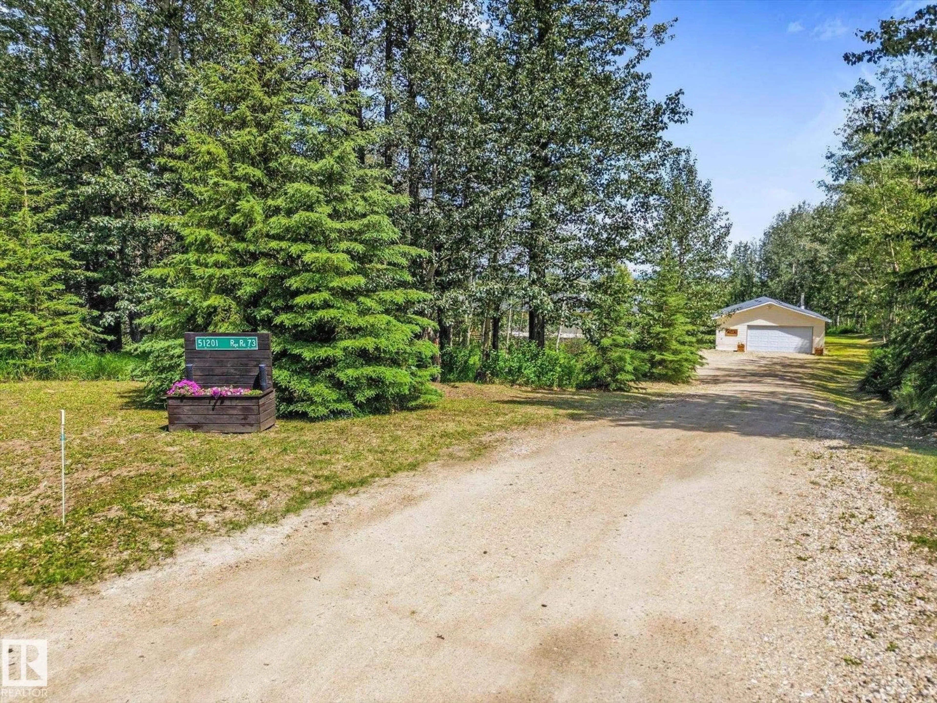 A pic from outside/outdoor area/front of a property/back of a property/a pic from drone, forest/trees view for 51201 RGE ROAD 73, Rural Parkland County Alberta T7A1S6