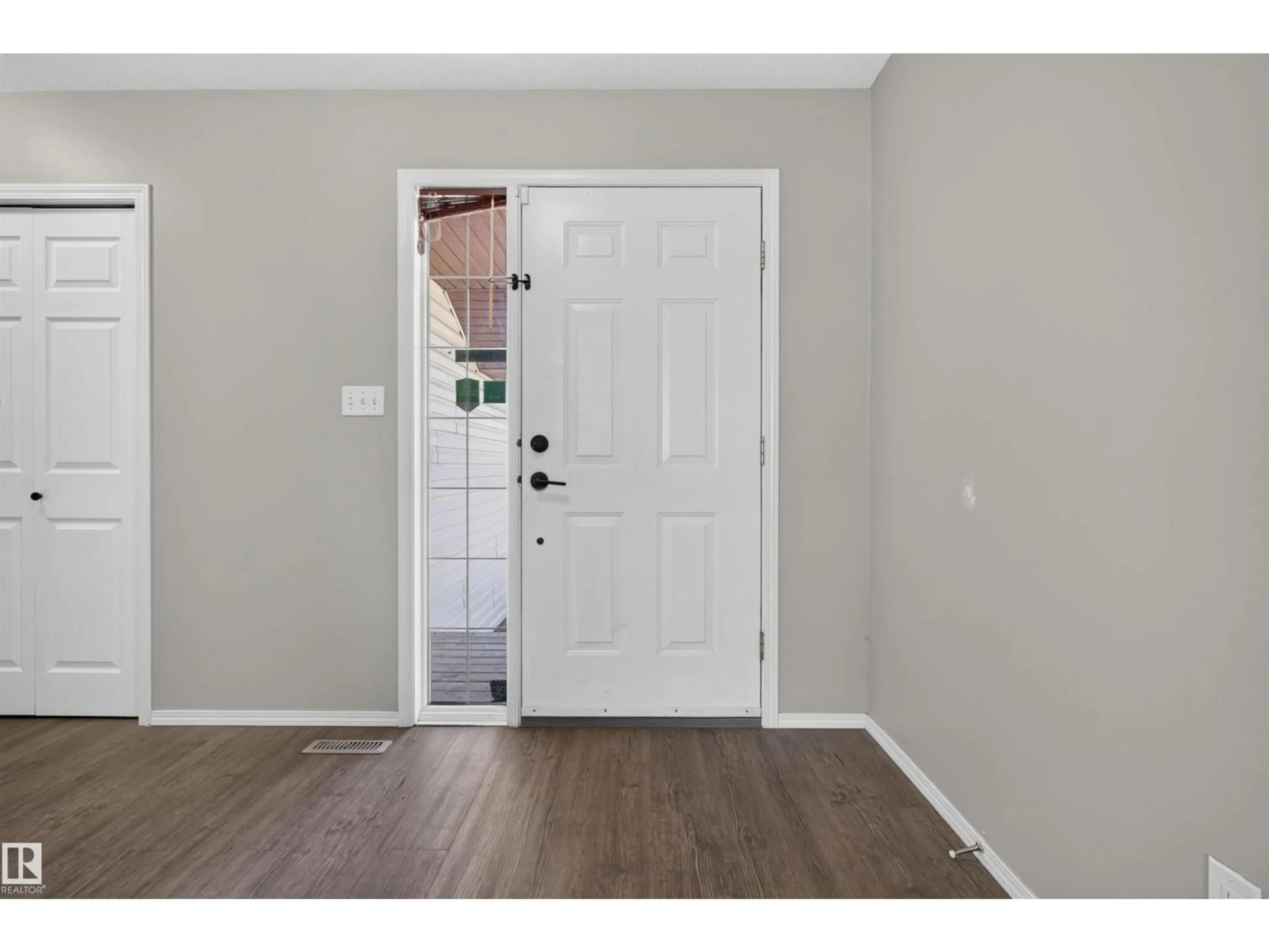Indoor entryway for 1816 36 AV, Edmonton Alberta T6T1S8