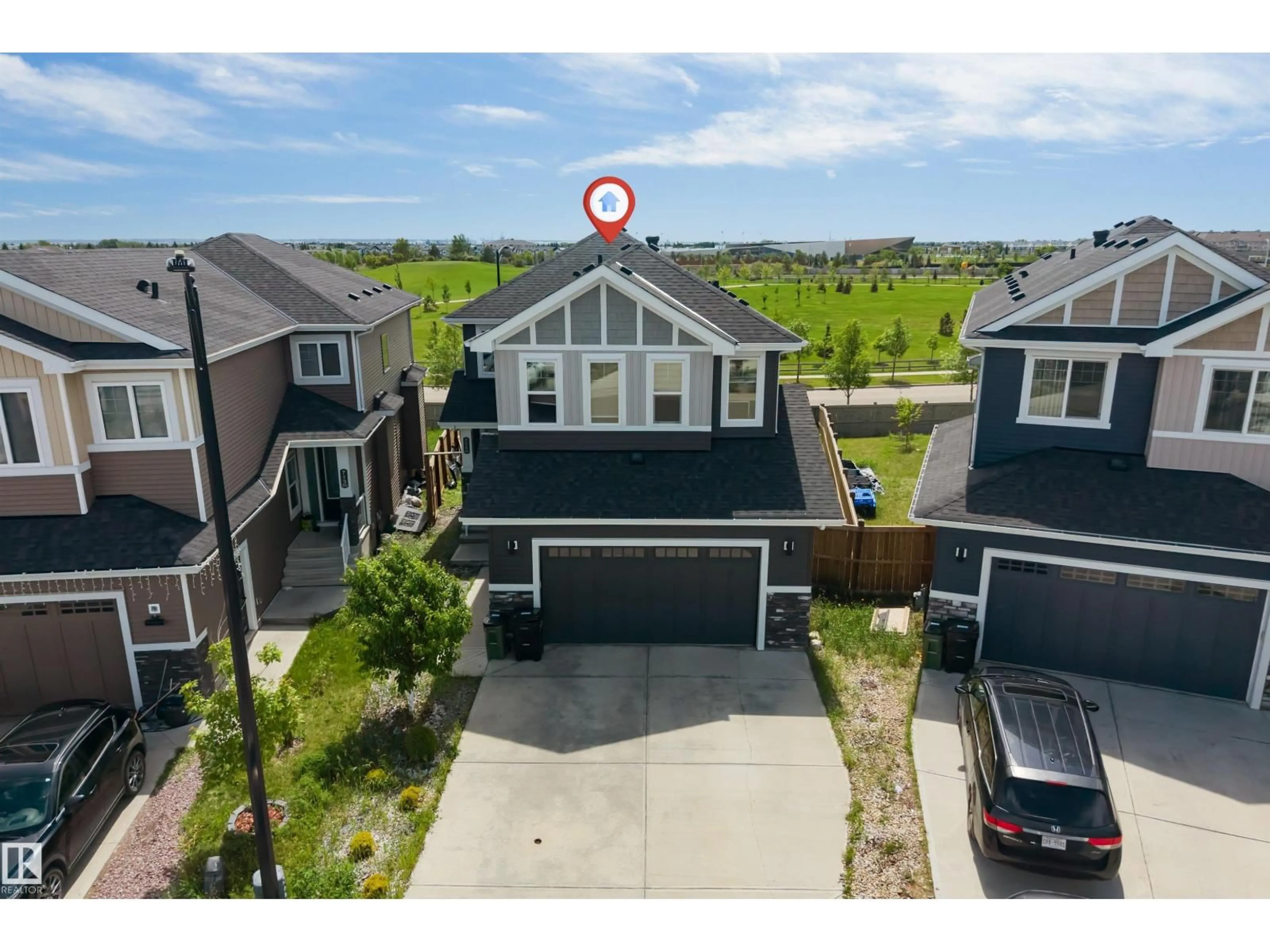 A pic from outside/outdoor area/front of a property/back of a property/a pic from drone, unknown for 715 EBBERS PL, Edmonton Alberta T5Y3V3