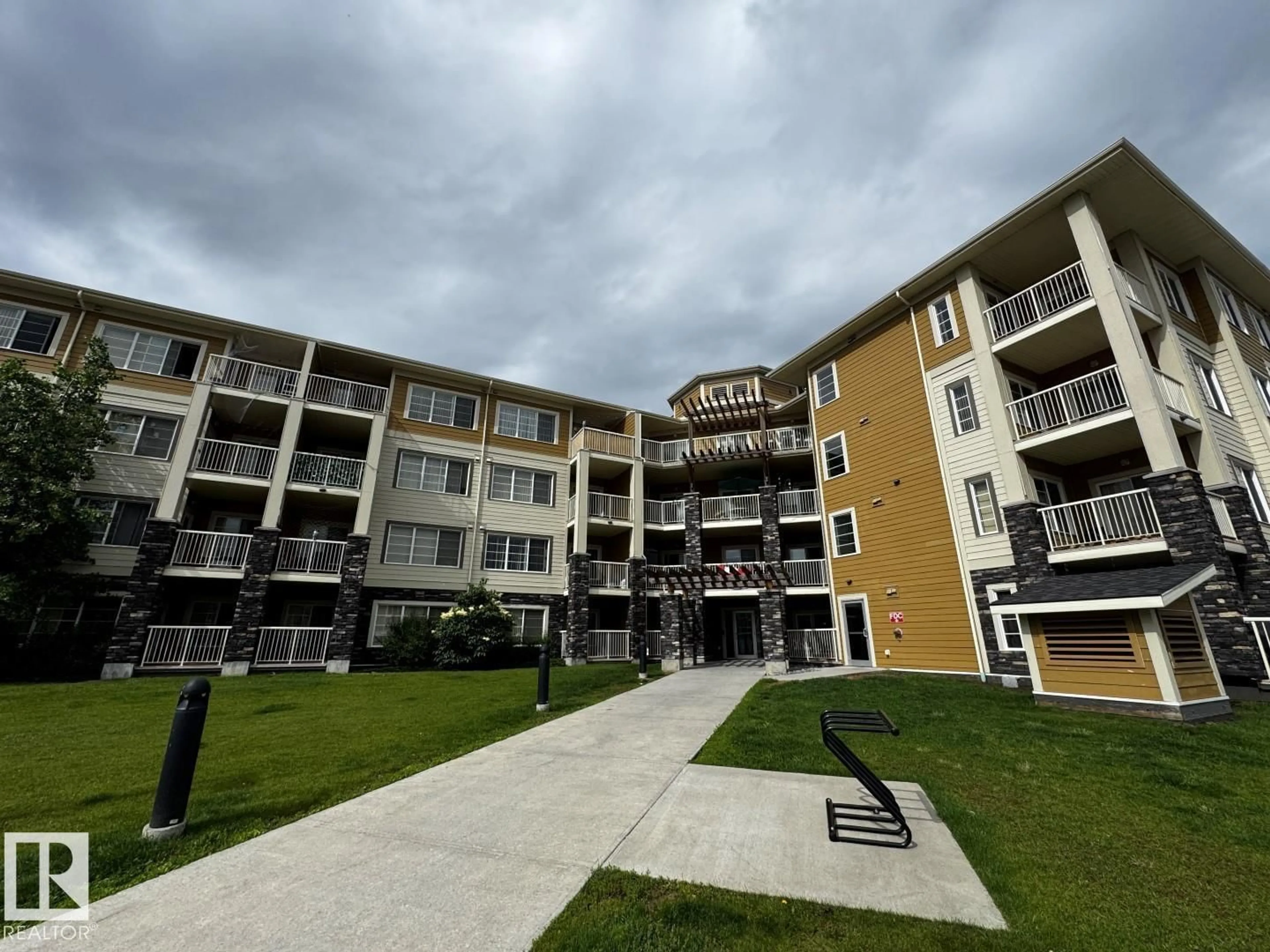 A pic from outside/outdoor area/front of a property/back of a property/a pic from drone, building for #405 - 3670 139 AV, Edmonton Alberta T5Y3N5