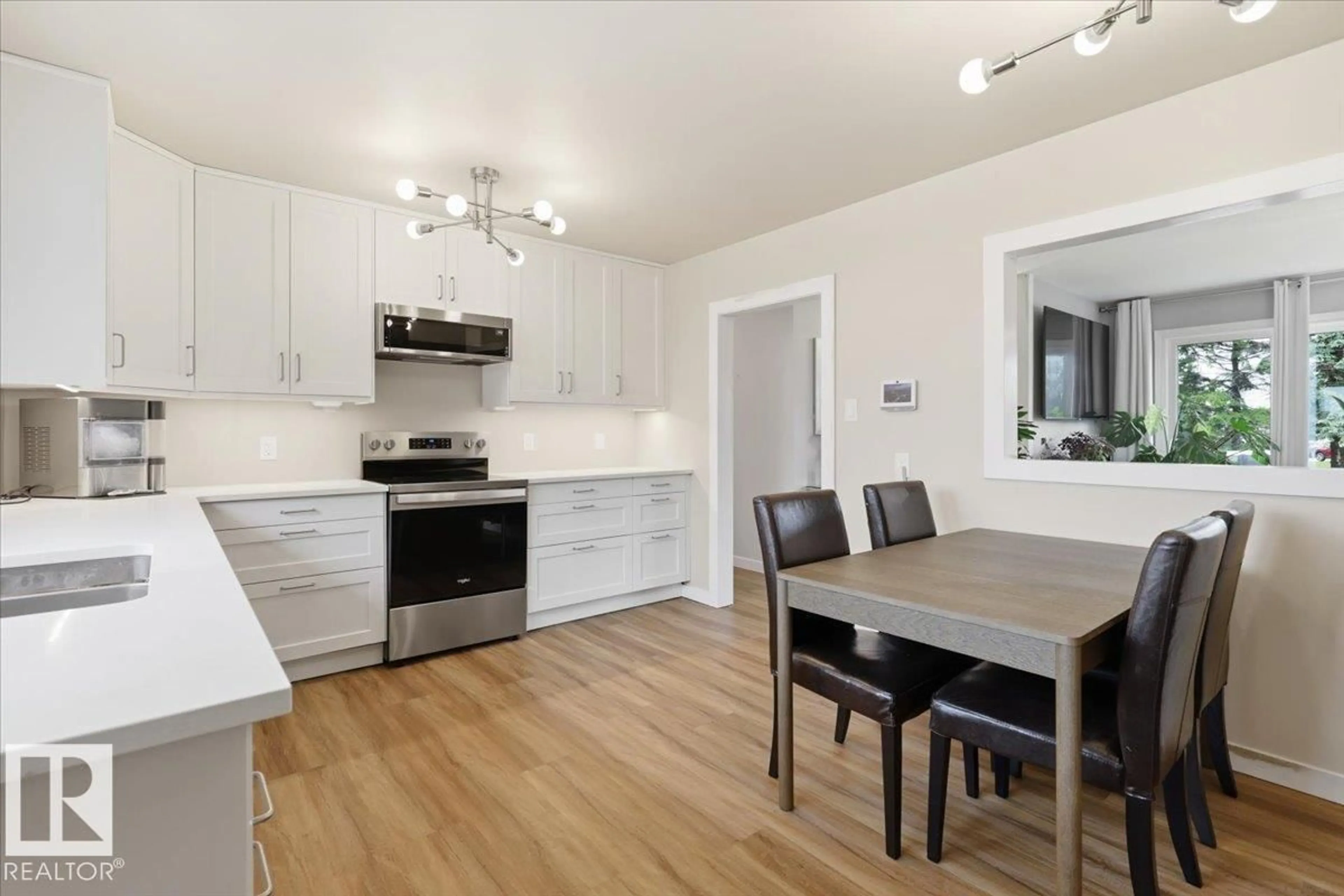 Open concept kitchen, wood/laminate floor for 5103 48 AV, Thorsby Alberta T0C2P0
