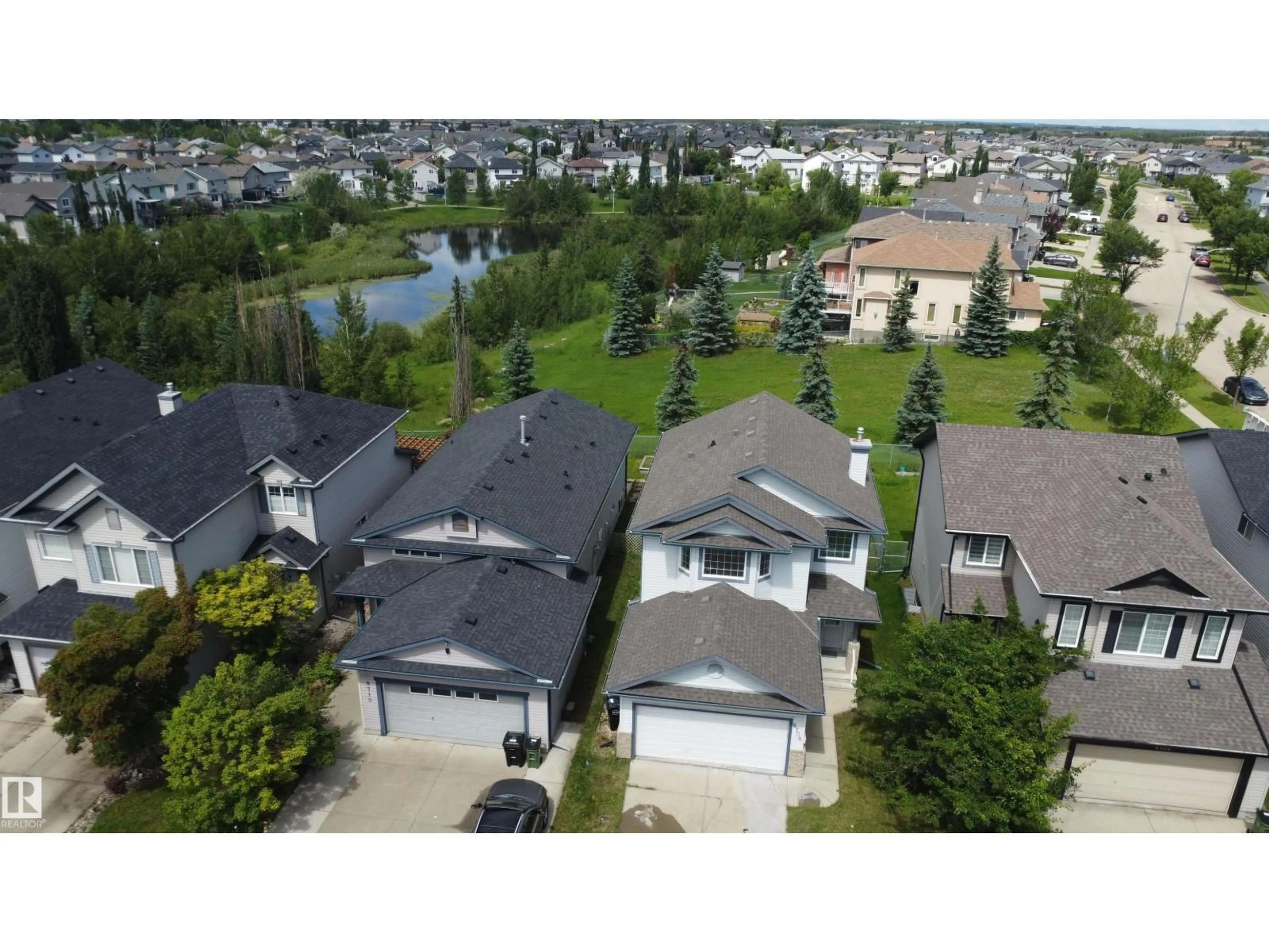 A pic from outside/outdoor area/front of a property/back of a property/a pic from drone, unknown for NW - 8708 175 AV, Edmonton Alberta T5Z3Z2