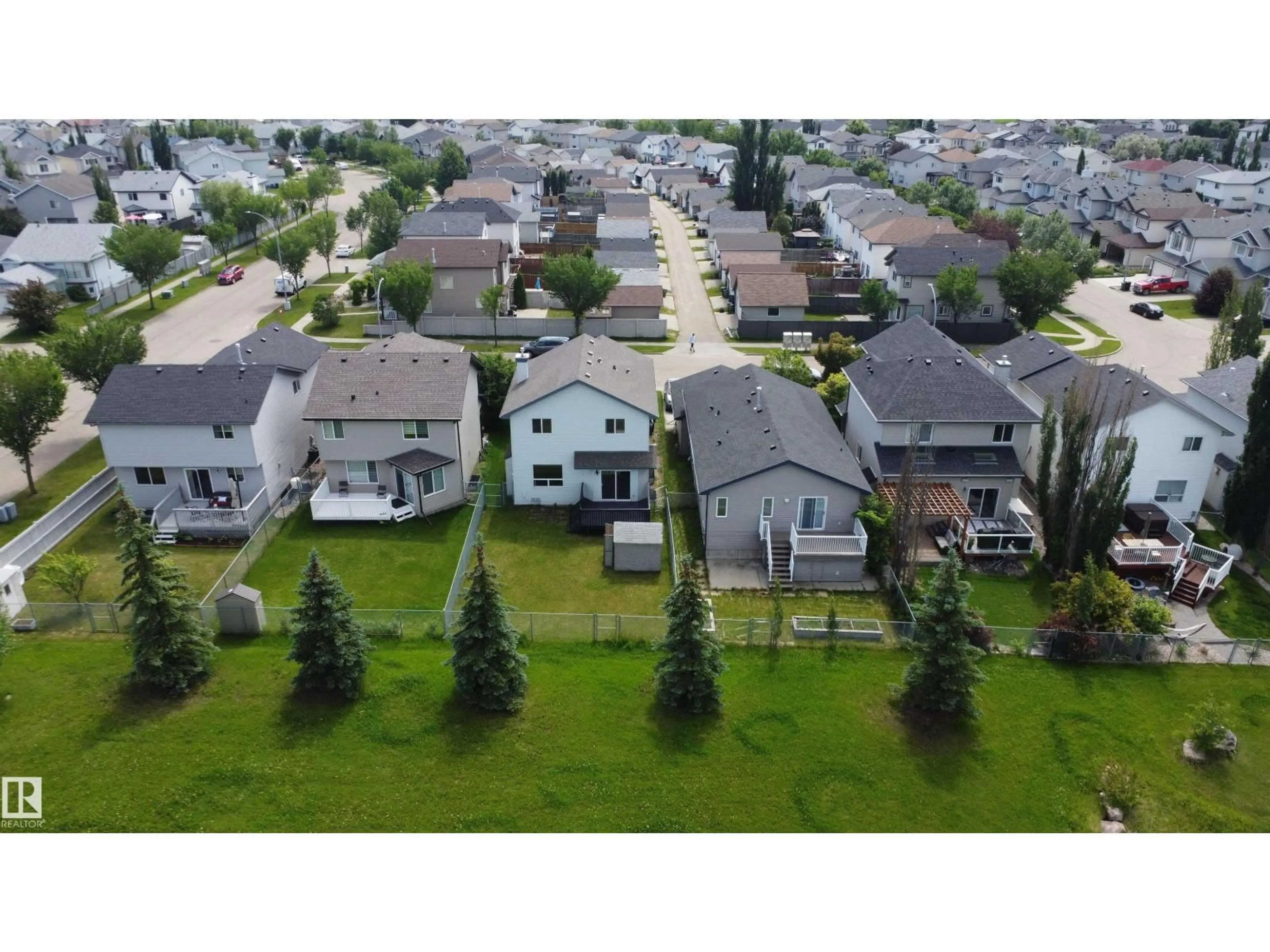 A pic from outside/outdoor area/front of a property/back of a property/a pic from drone, unknown for NW - 8708 175 AV, Edmonton Alberta T5Z3Z2