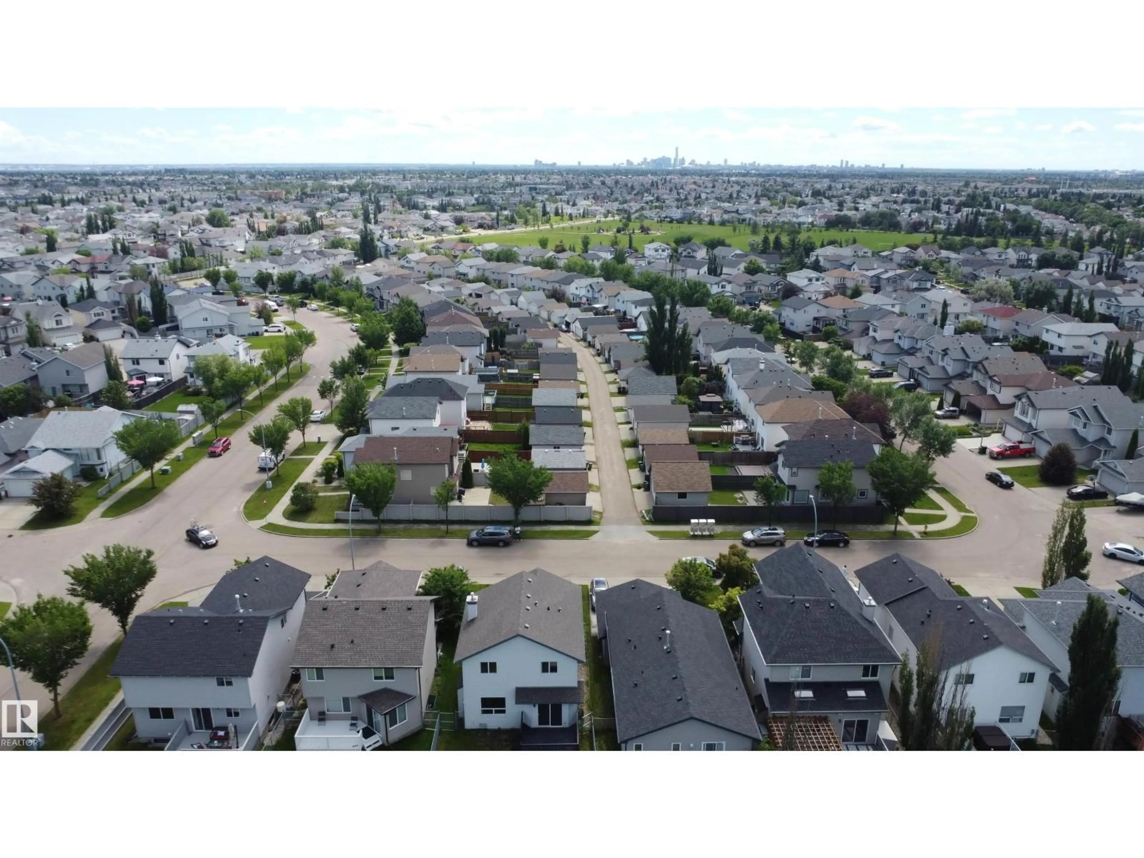 A pic from outside/outdoor area/front of a property/back of a property/a pic from drone, street for NW - 8708 175 AV, Edmonton Alberta T5Z3Z2