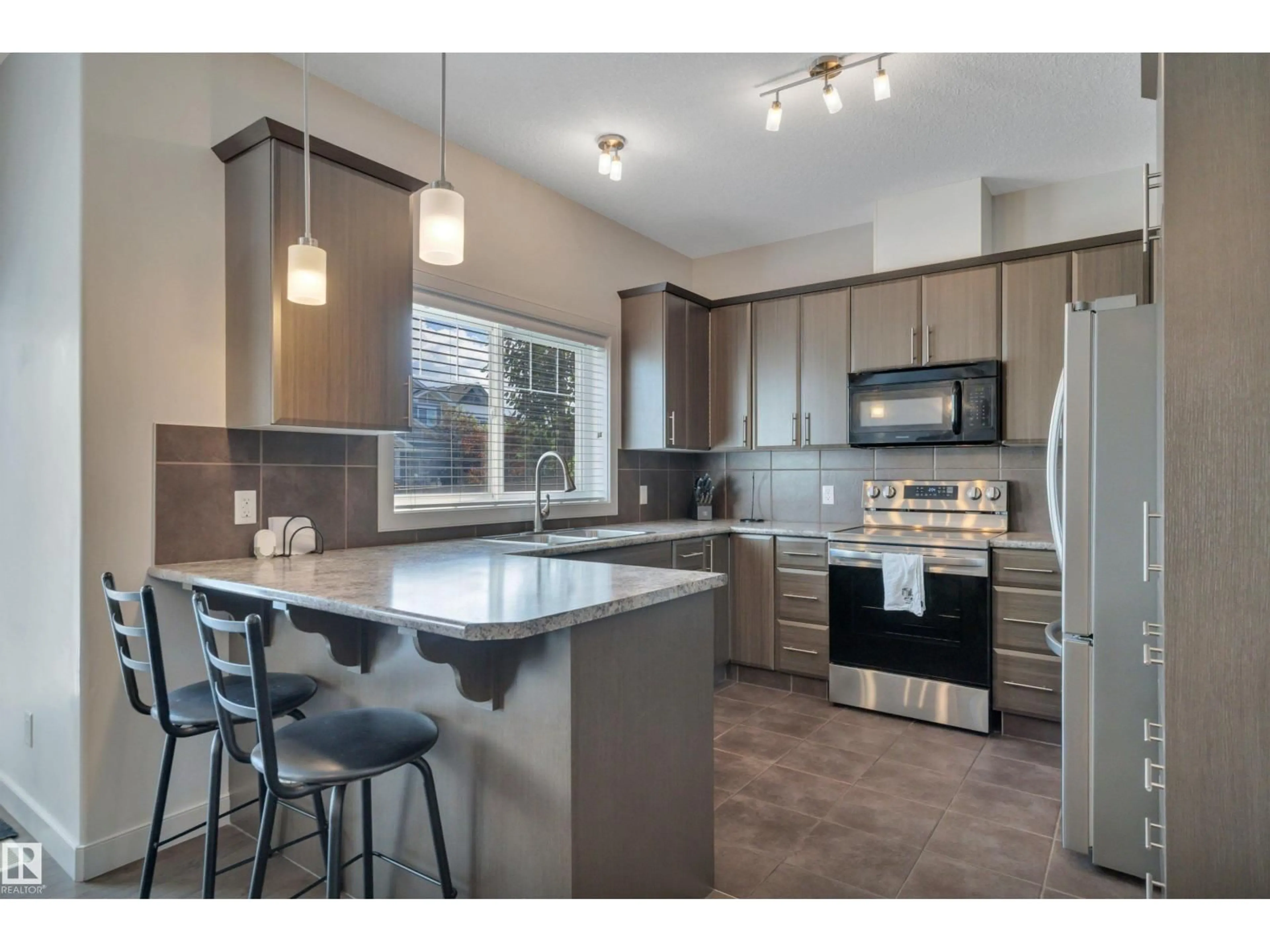 Open concept kitchen, unknown for 36 - 450 MCCONACHIE WY, Edmonton Alberta T5Y0S8