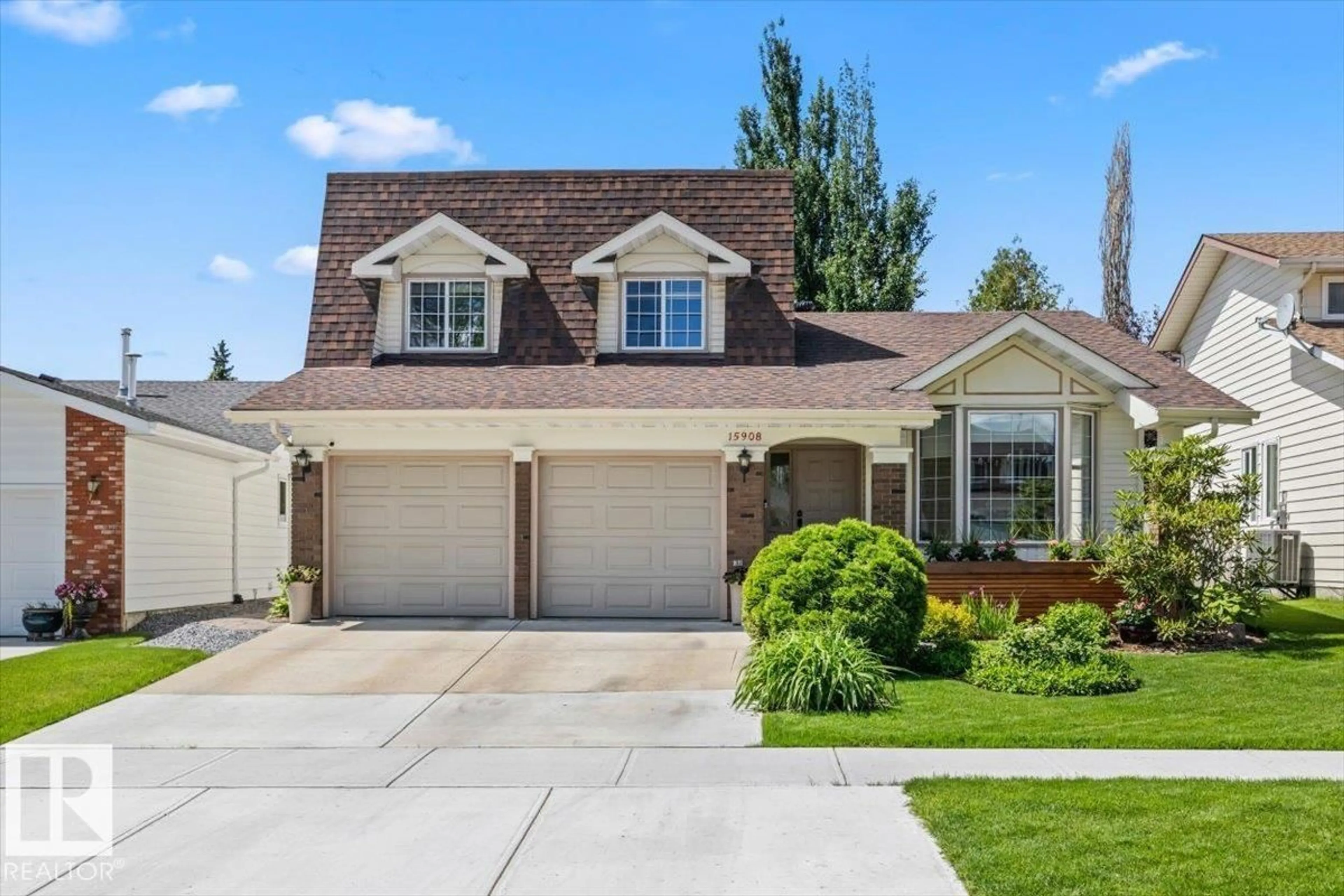 Home with vinyl exterior material, street for NW - 15908 112 ST, Edmonton Alberta T5X4S8