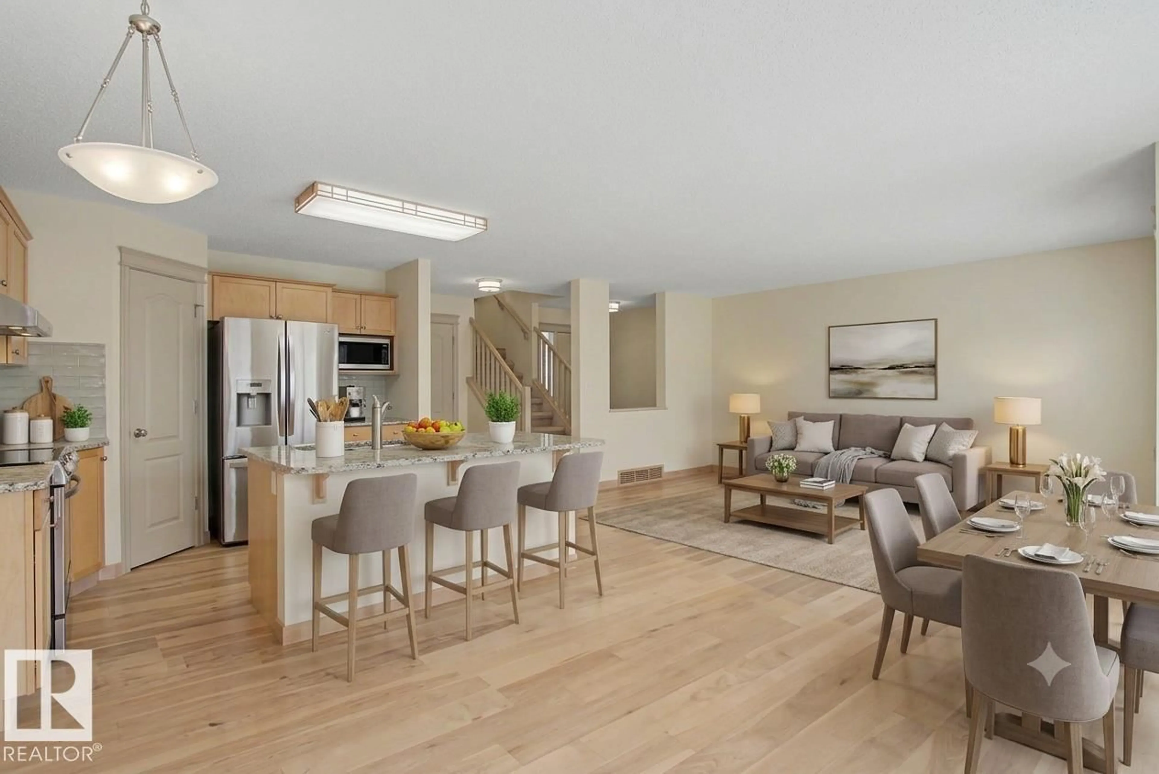 Open concept kitchen, wood/laminate floor for SW - 8311 11 AV, Edmonton Alberta T6X1E3