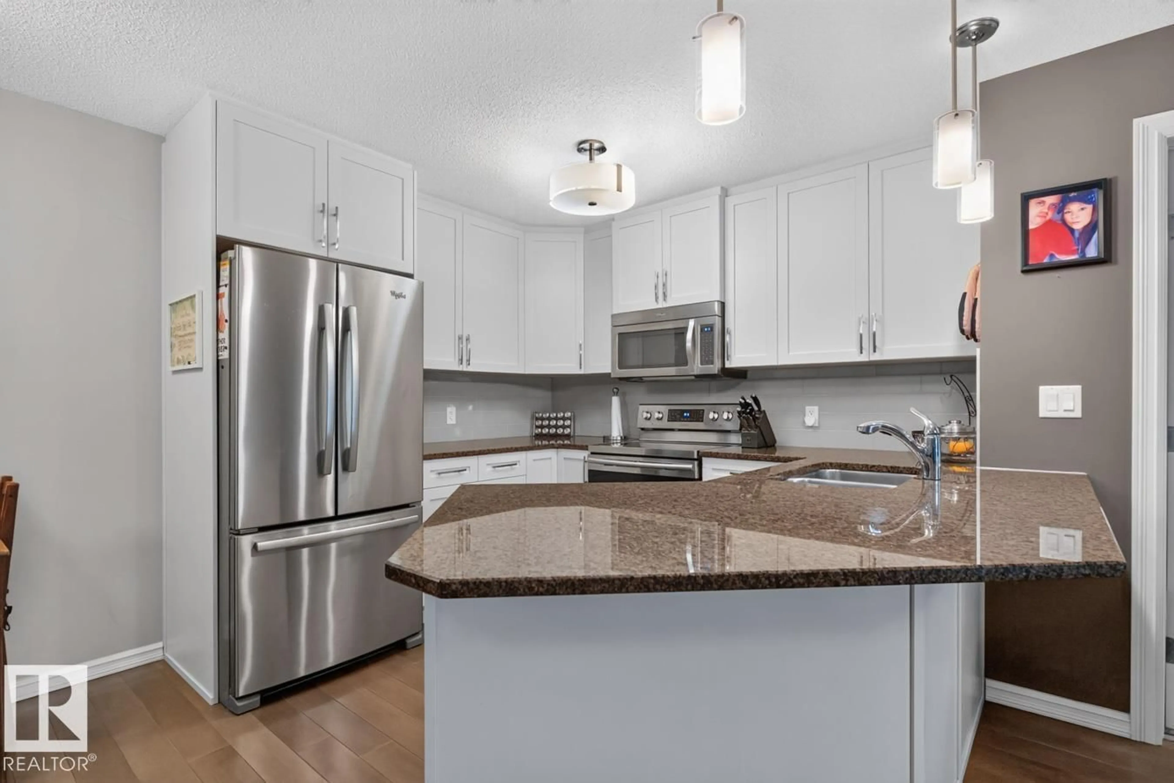 Open concept kitchen, unknown for #103 - 2203 44 AV, Edmonton Alberta T6T0G5