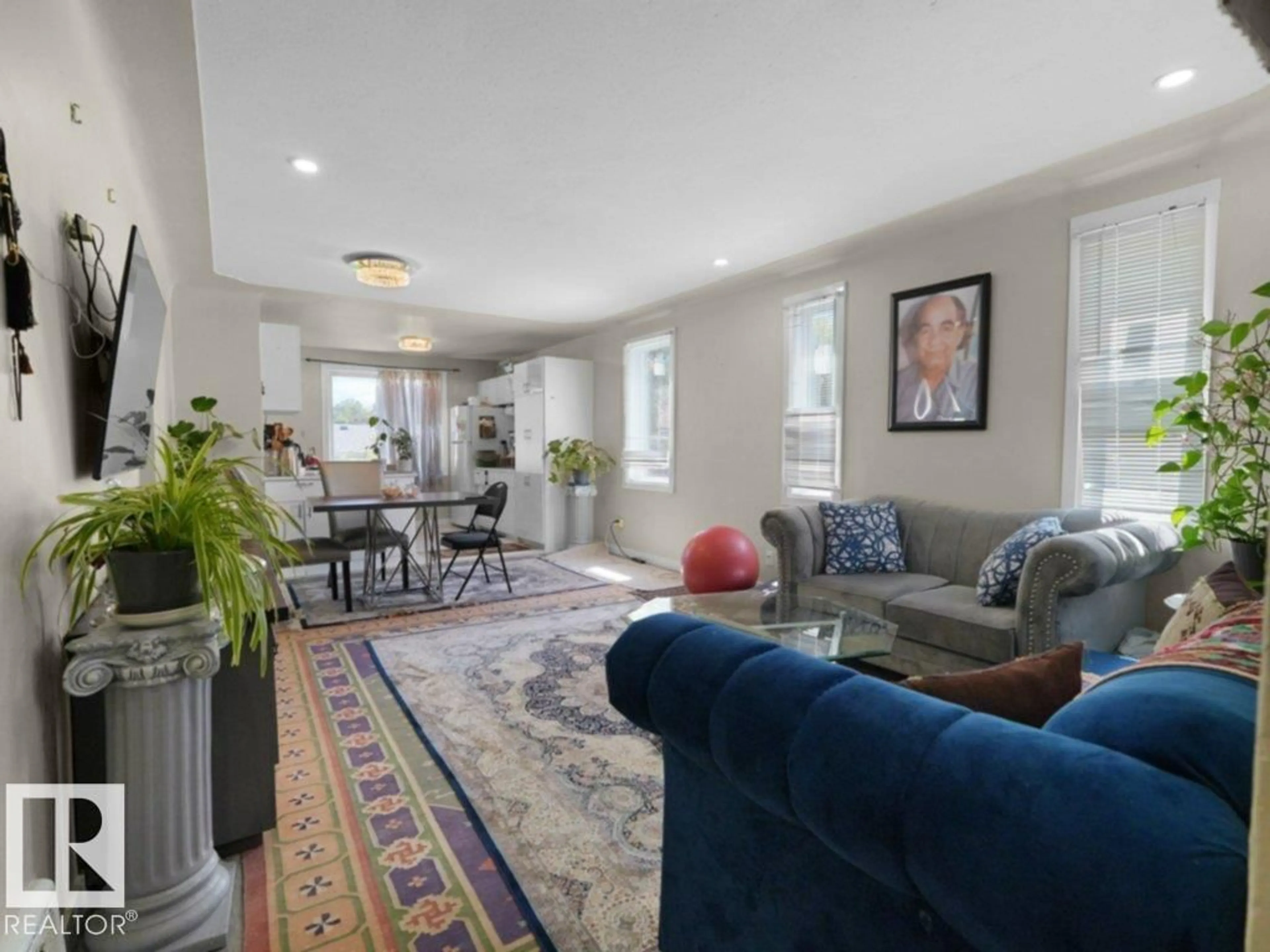 Living room with furniture, unknown for 10857 97 ST, Edmonton Alberta T5H2M6