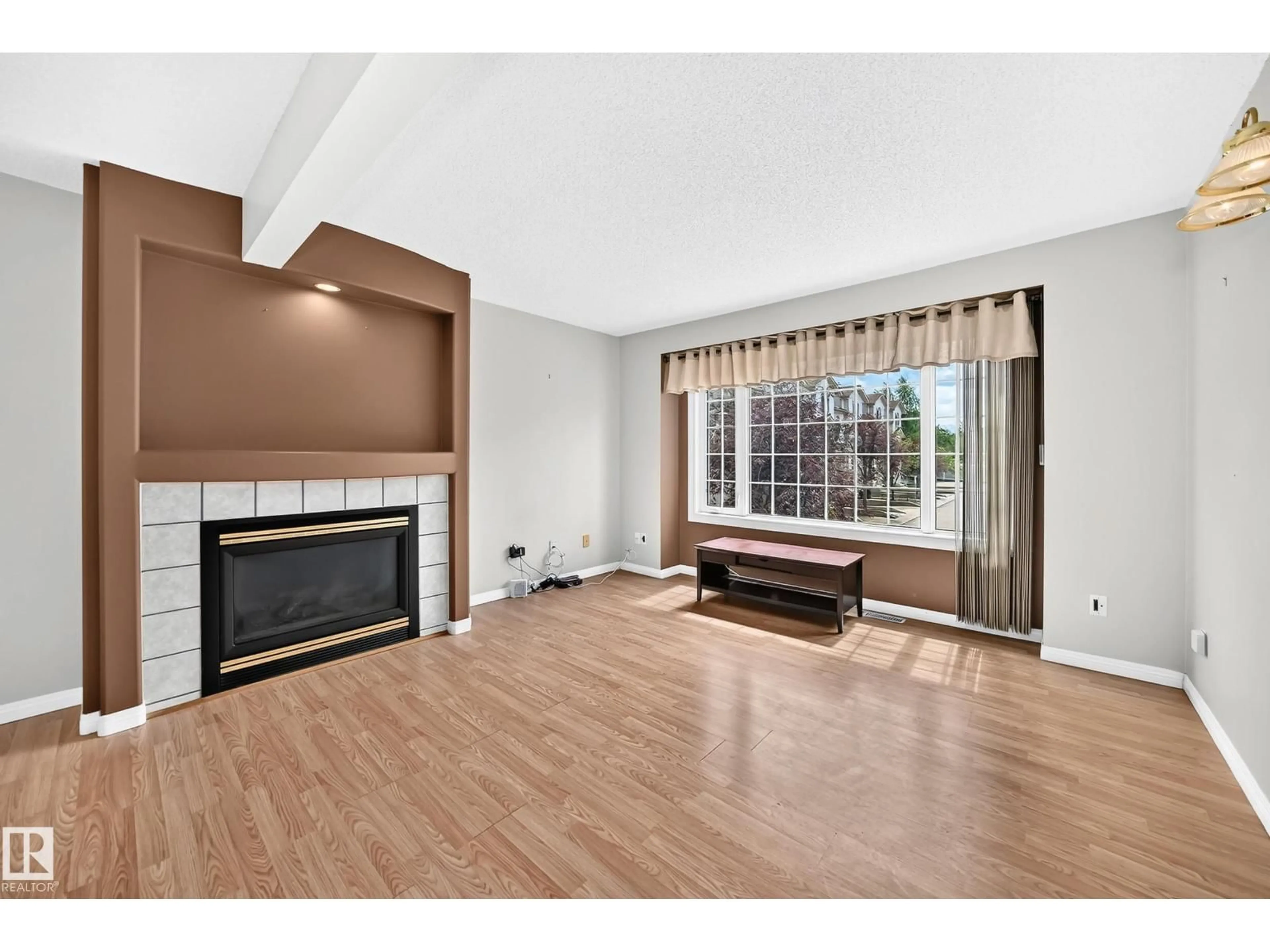 Living room with furniture, wood/laminate floor for #51 - 9630 176 ST, Edmonton Alberta T5T6E1