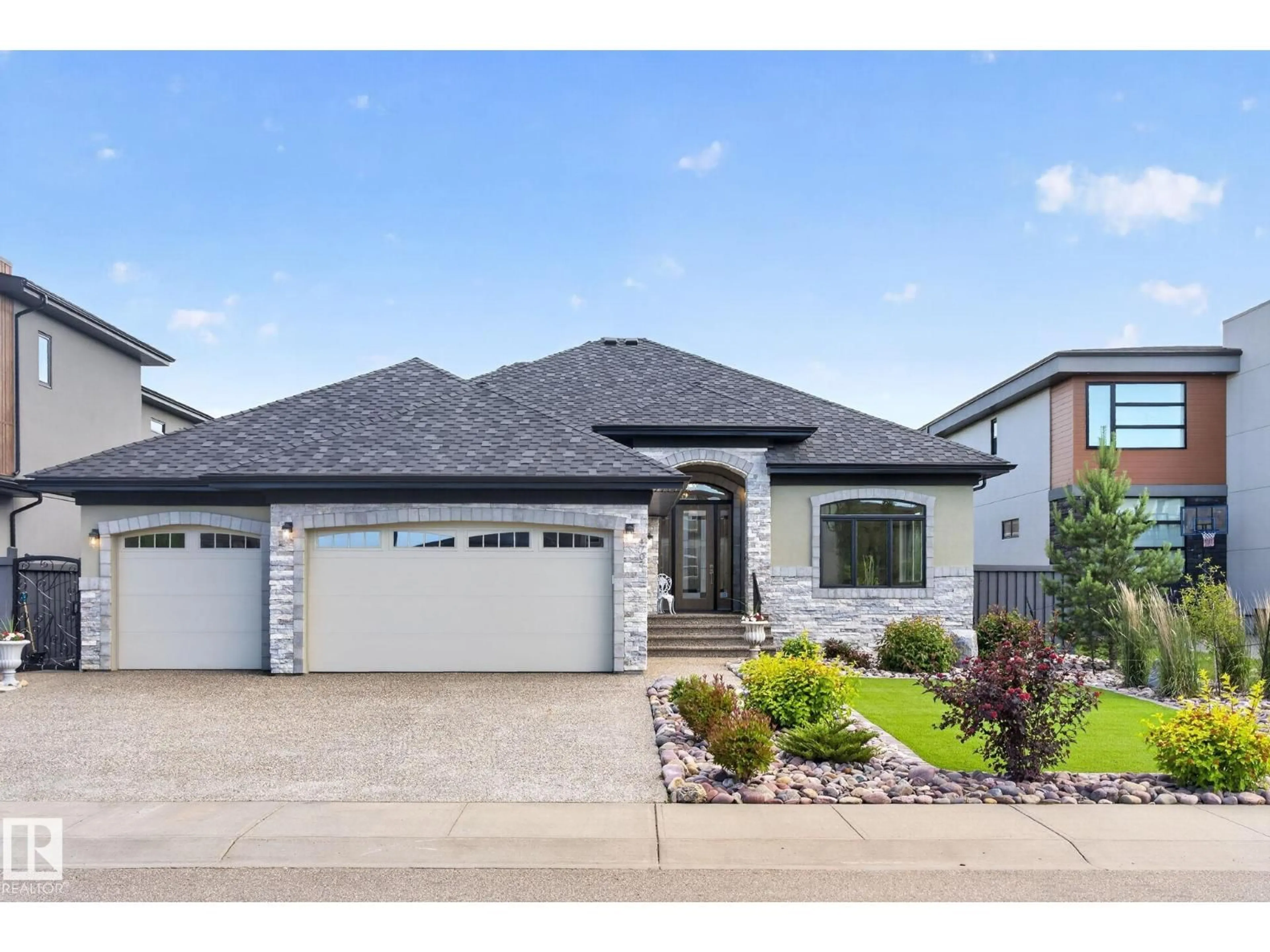 Home with brick exterior material, street for SW - 4707 WOOLSEY CM, Edmonton Alberta T6W2E2