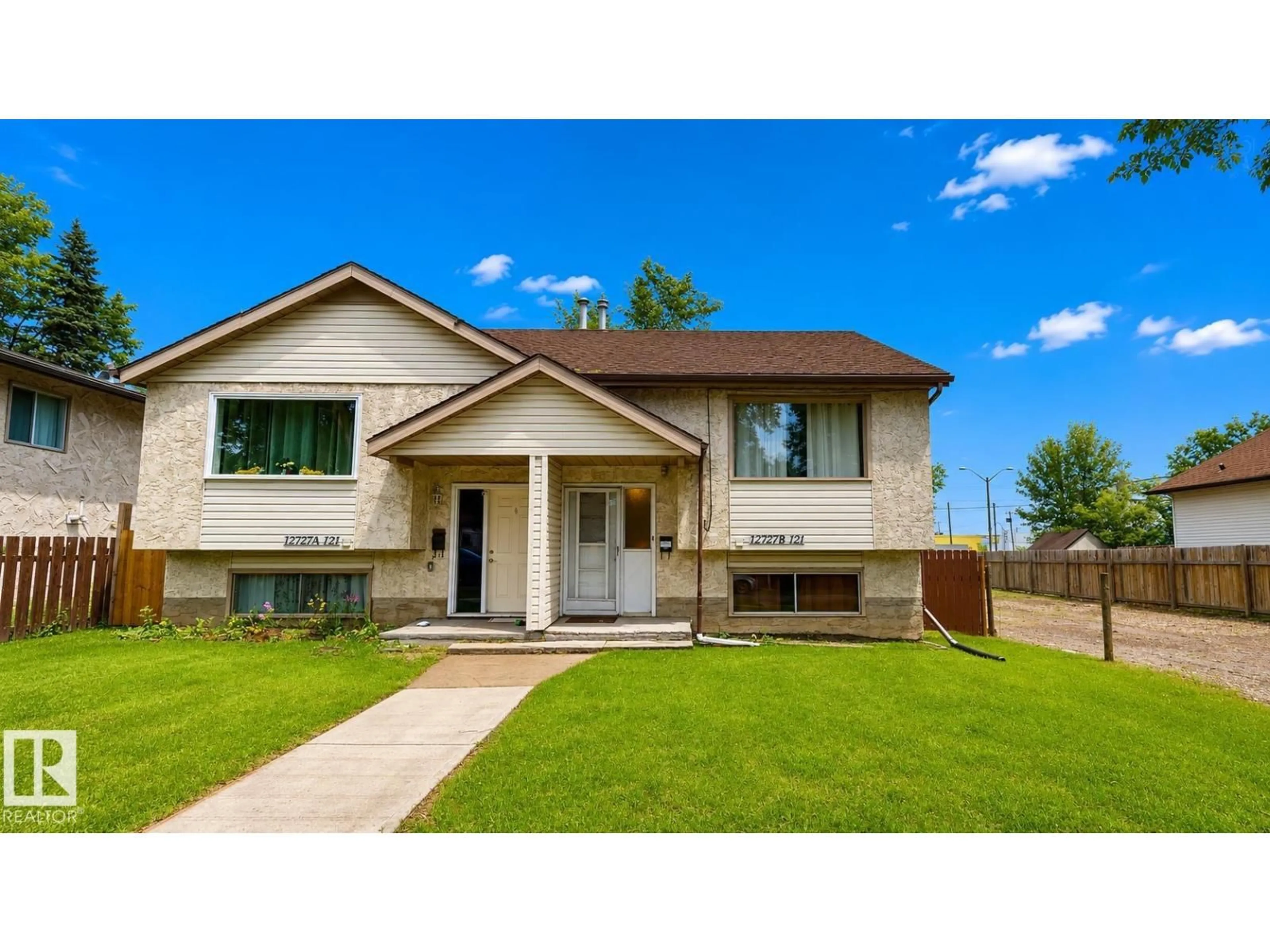 Home with vinyl exterior material, street for NW - 12727B 121 ST, Edmonton Alberta T5L0A8